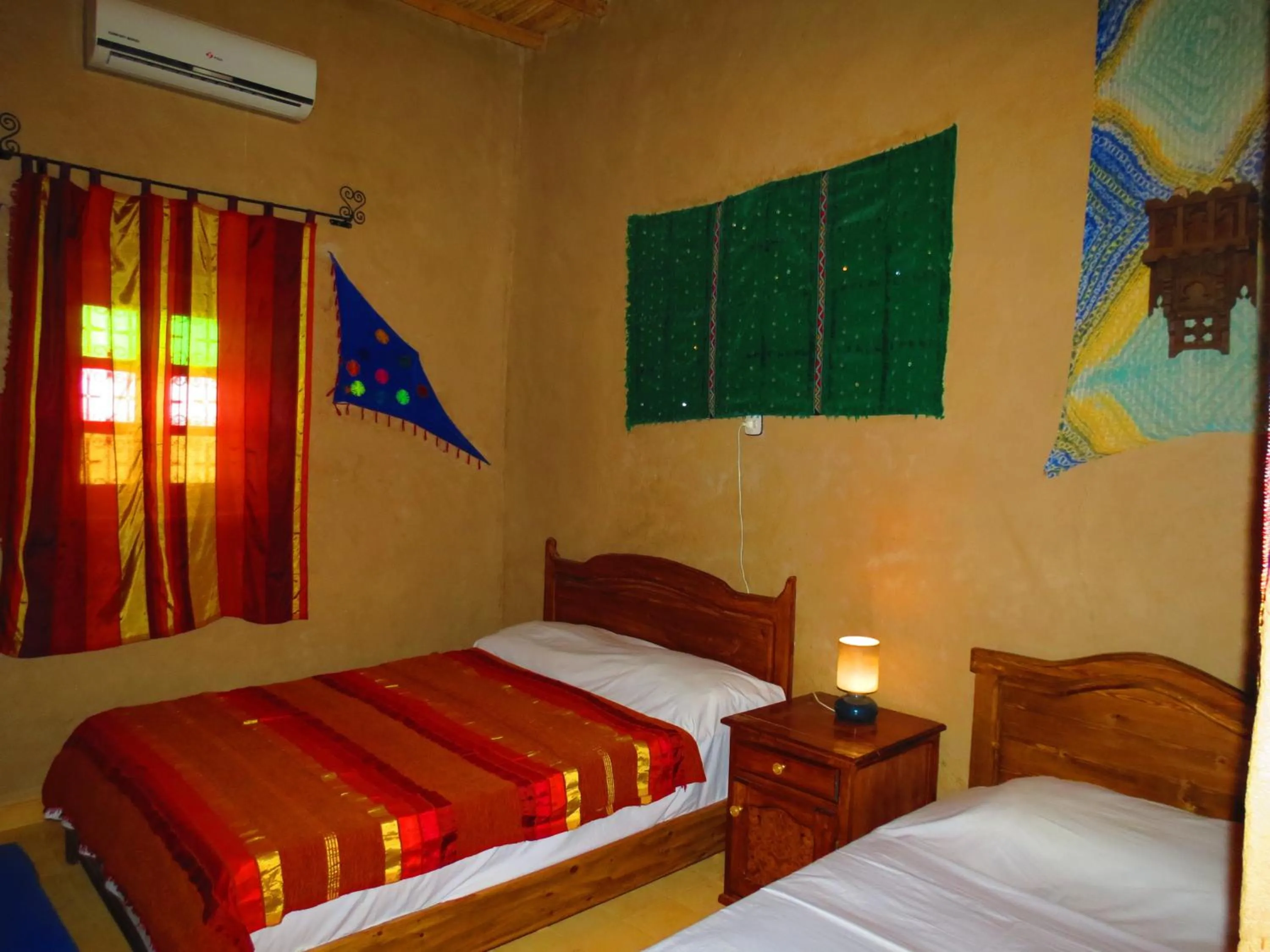 Bed in Hôtel Riad Tadarte Familier