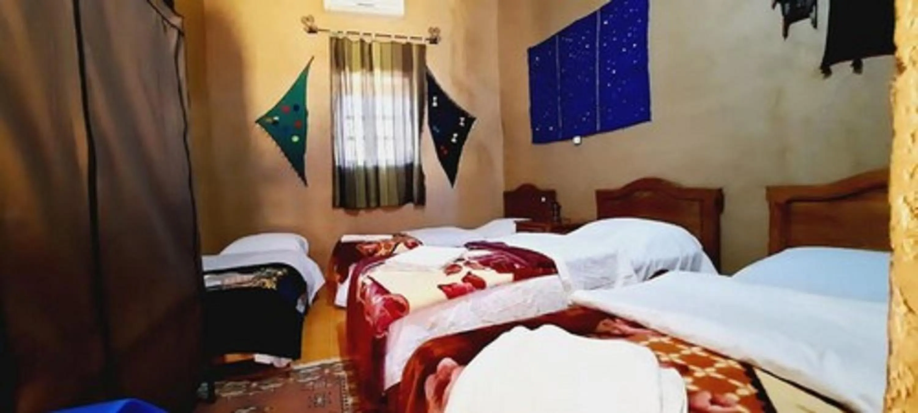 Bed in Hôtel Riad Tadarte Familier