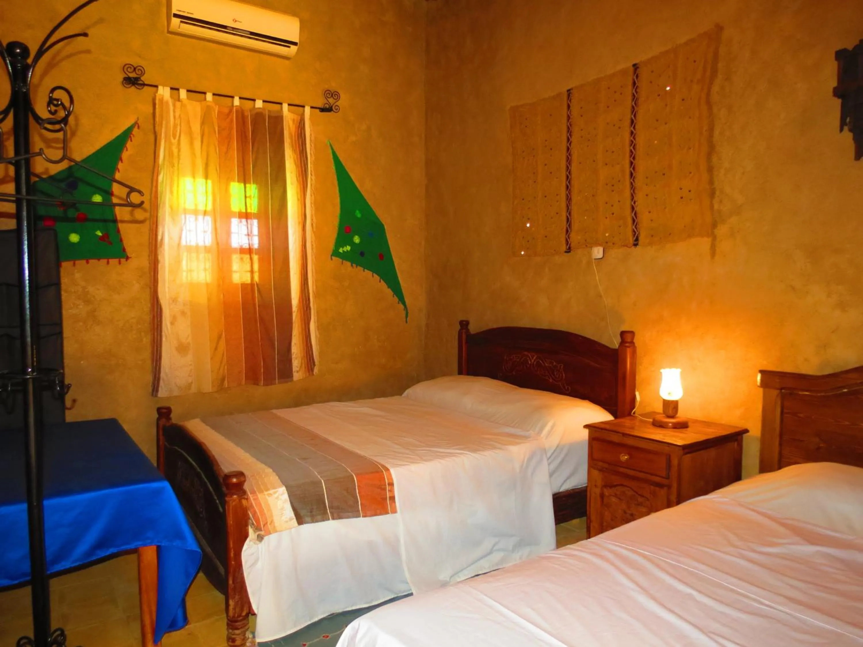 Bed in Hôtel Riad Tadarte Familier