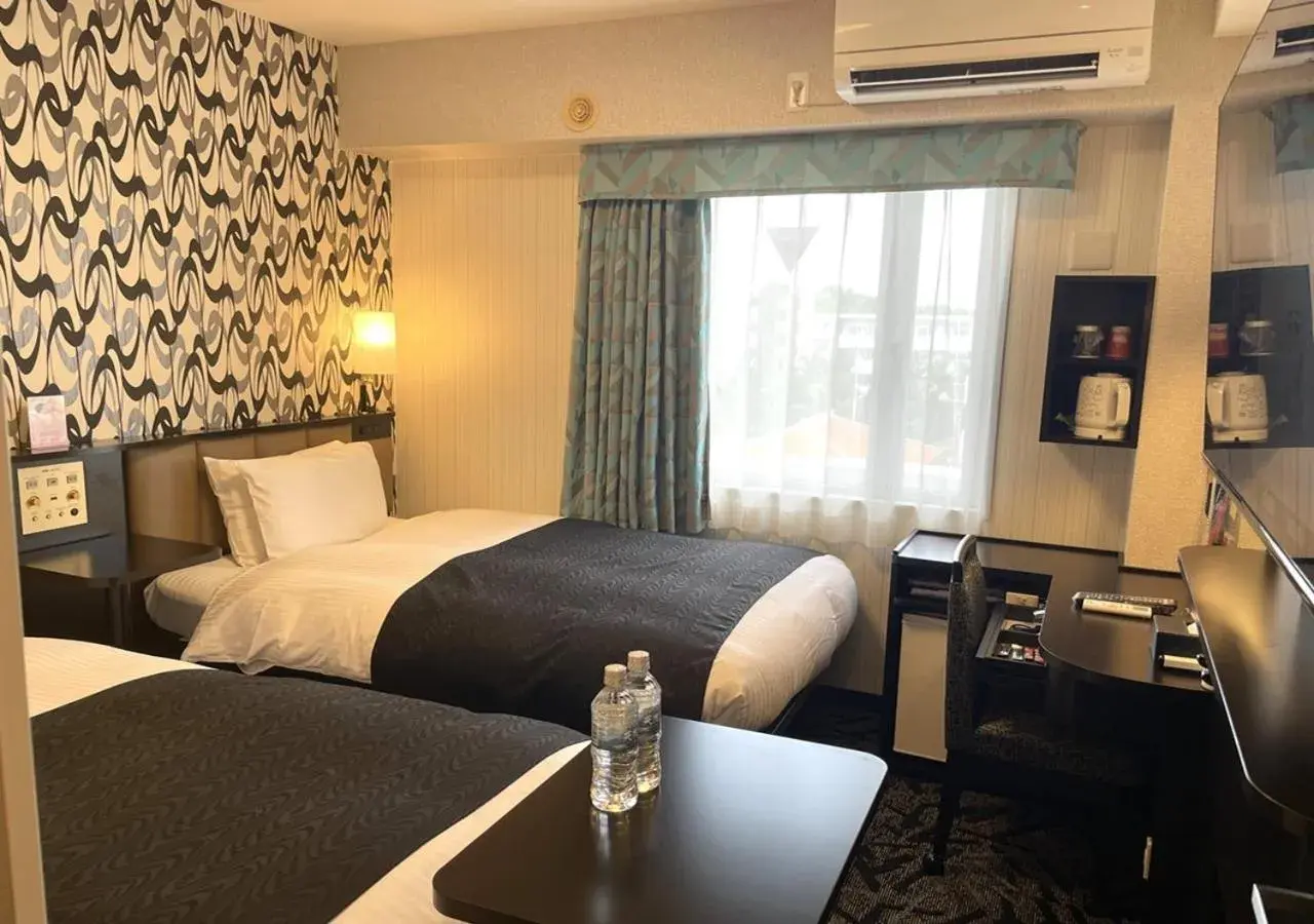 Bed in APA Hotel Ishigakijima Bed in APA Hotel Ishigakijima