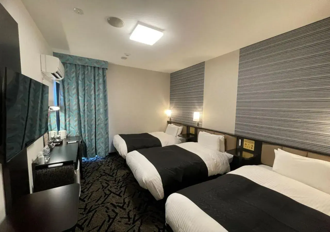 Bed in APA Hotel Ishigakijima Bed in APA Hotel Ishigakijima