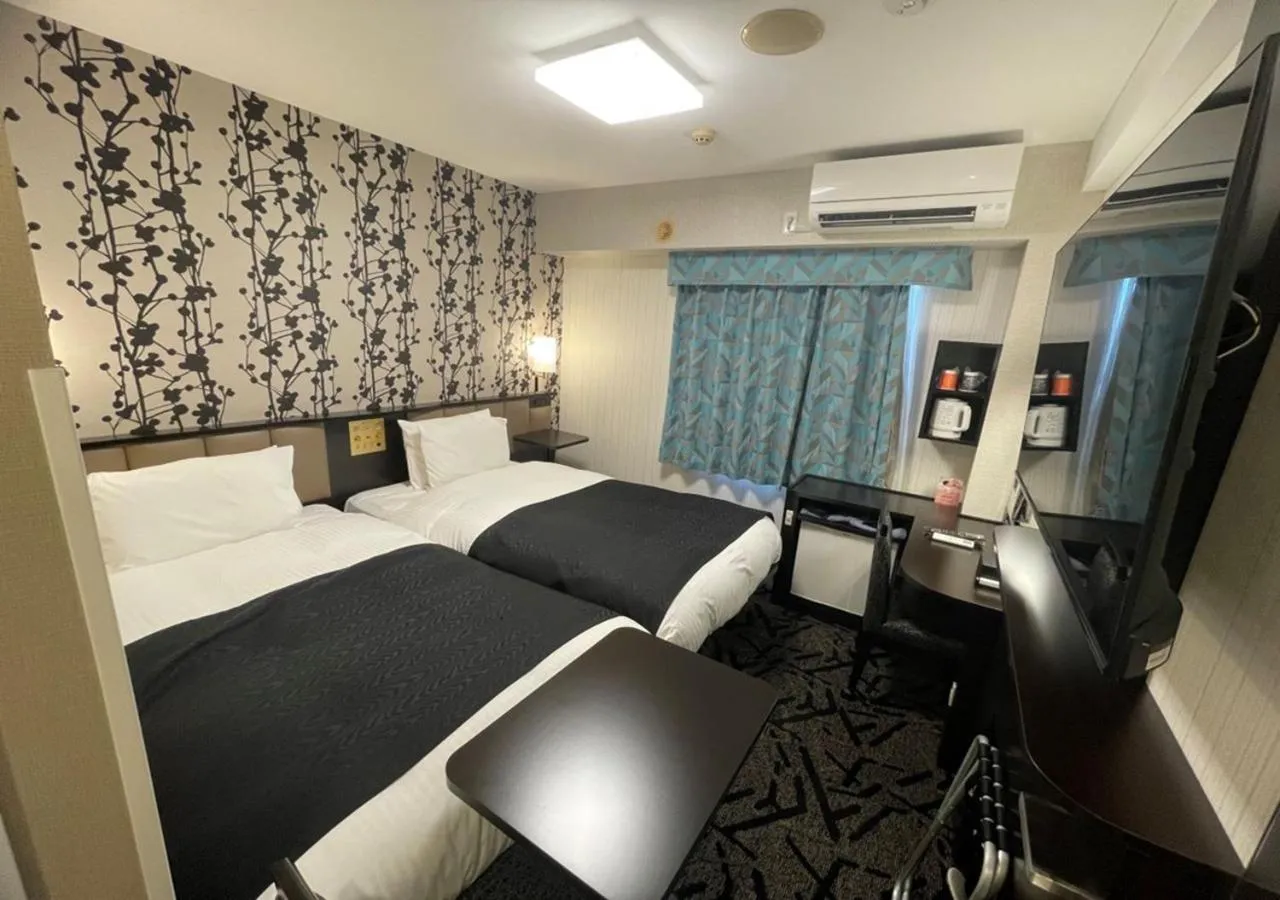 Bed in APA Hotel Ishigakijima