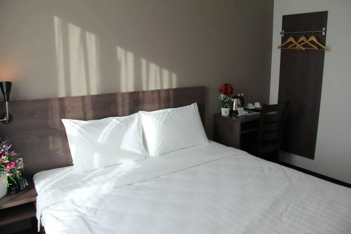 Photo of the whole room, Bed in KL Hotel