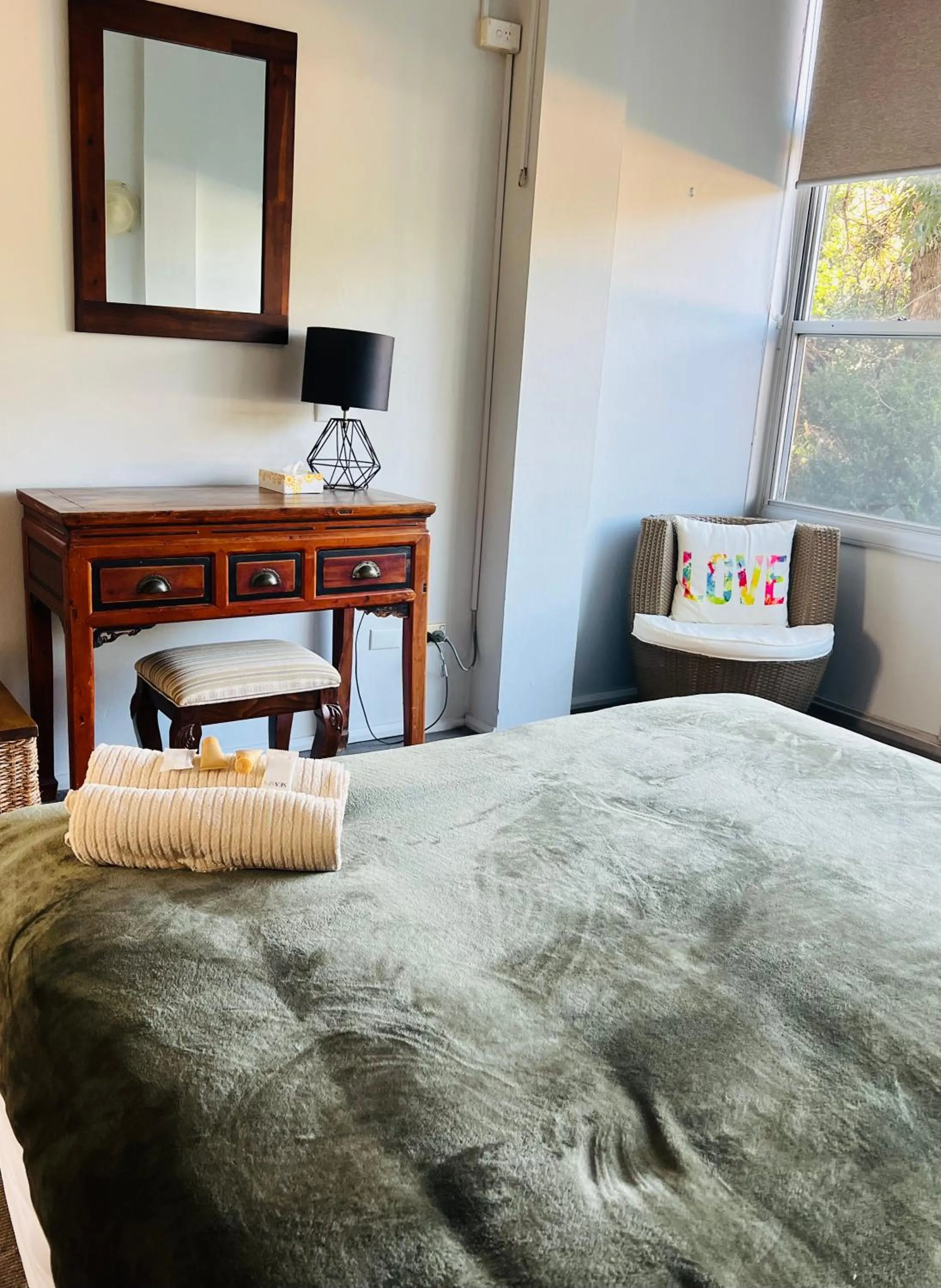 Bed in Ettalong Beach motel