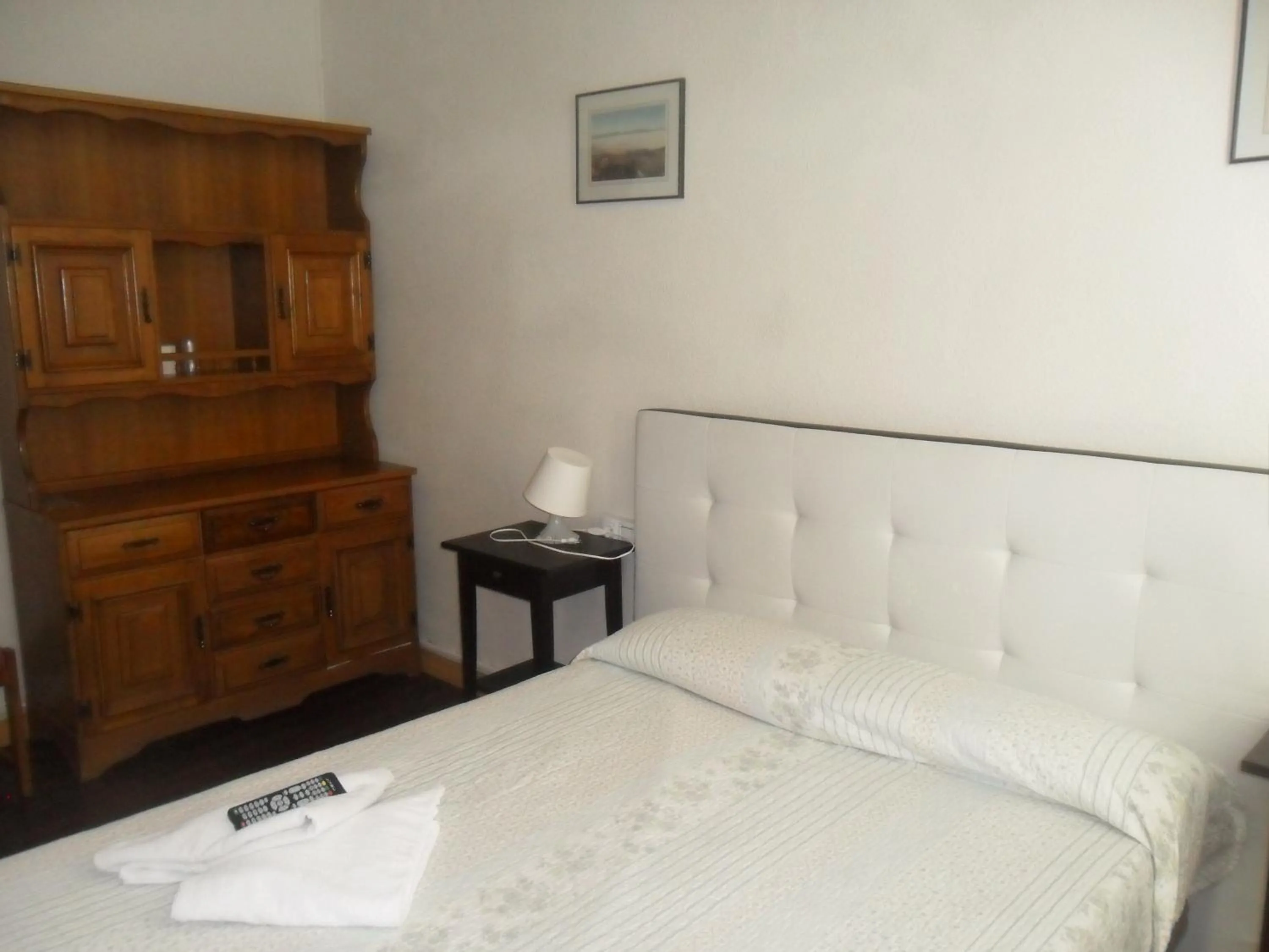 Photo of the whole room, Bed in Hostal Porta De Núria