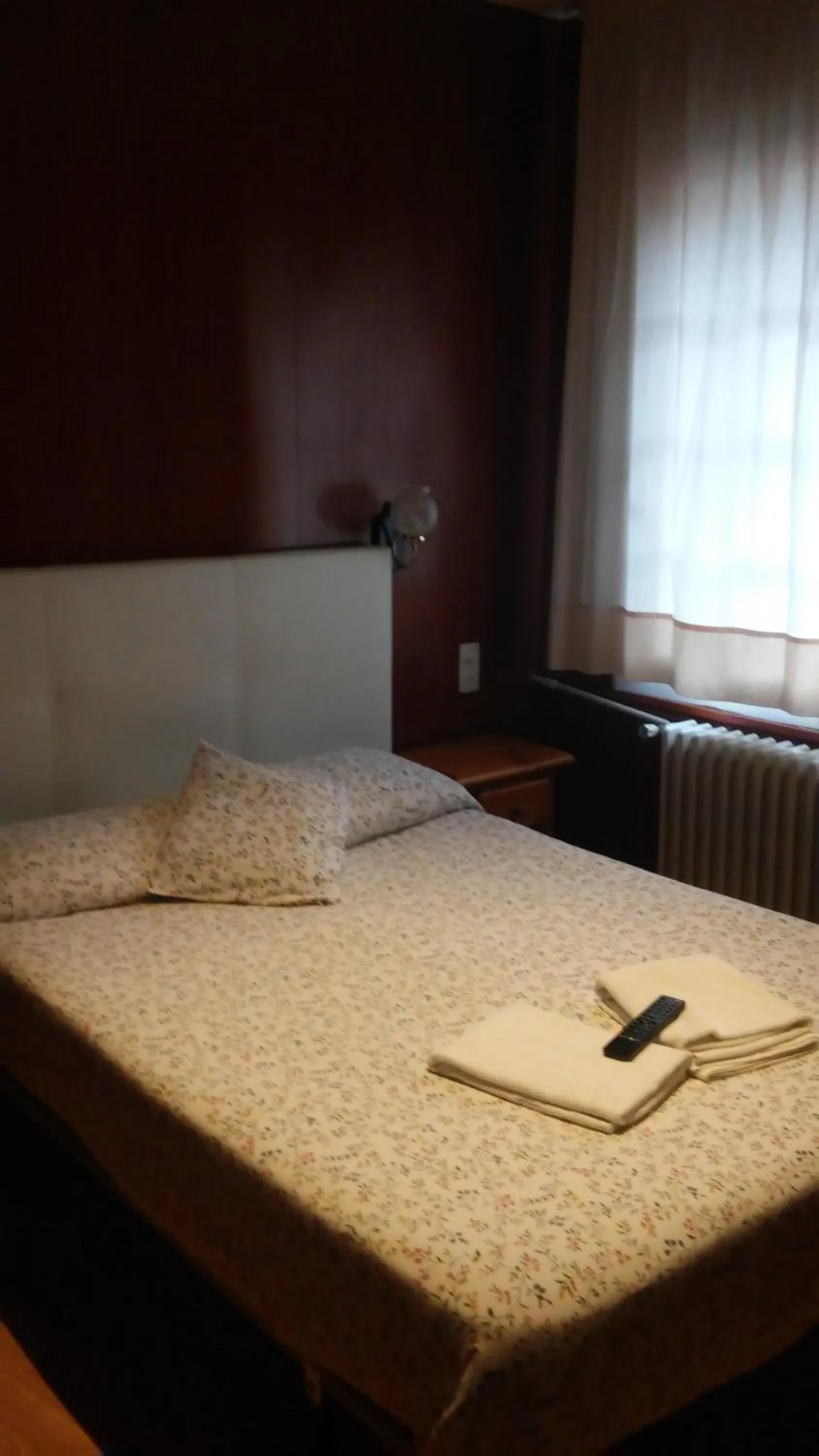 Photo of the whole room, Bed in Hostal Porta De Núria