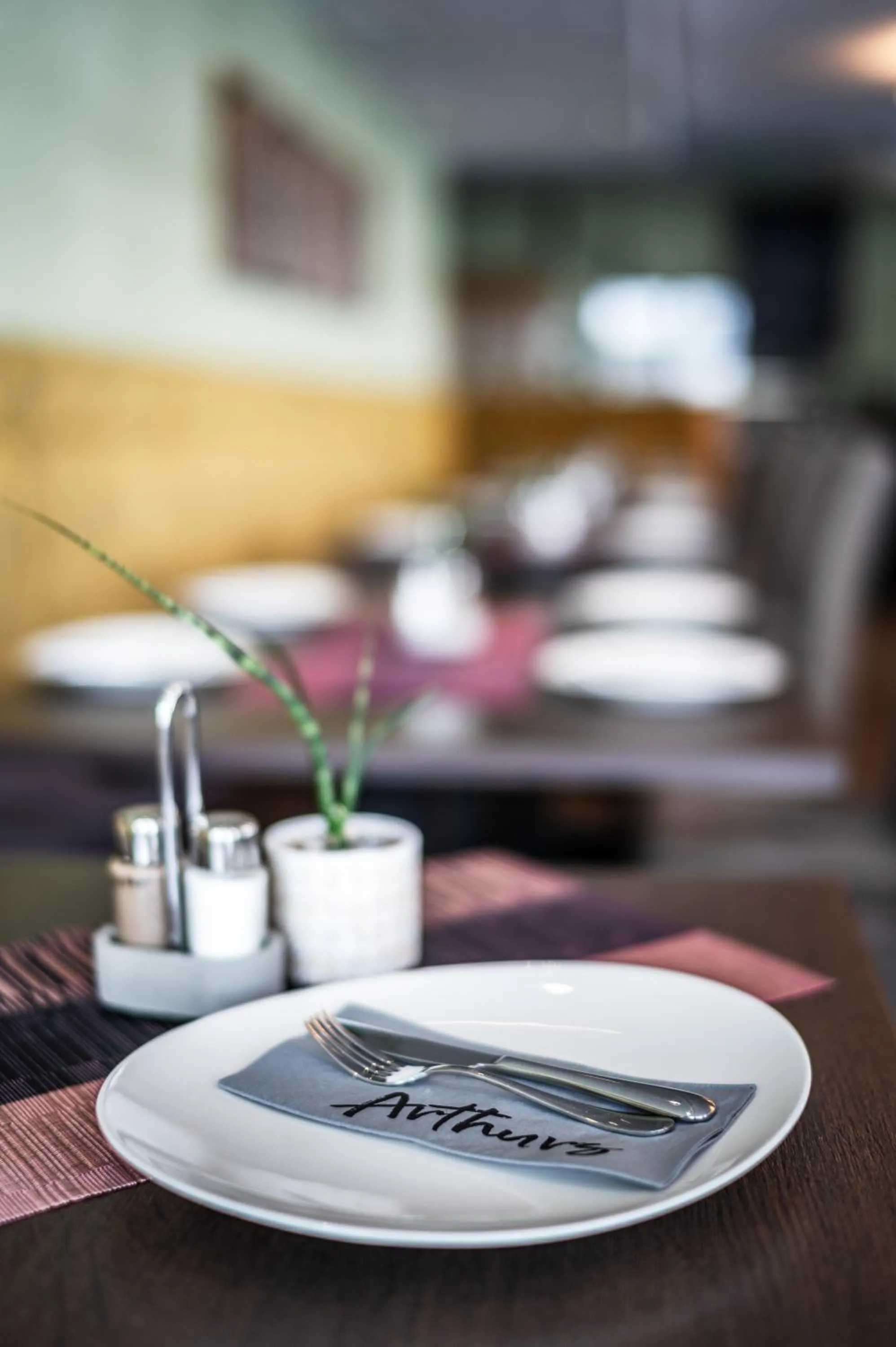 Bed in Arthur's Hotel und Apartments am Achensee