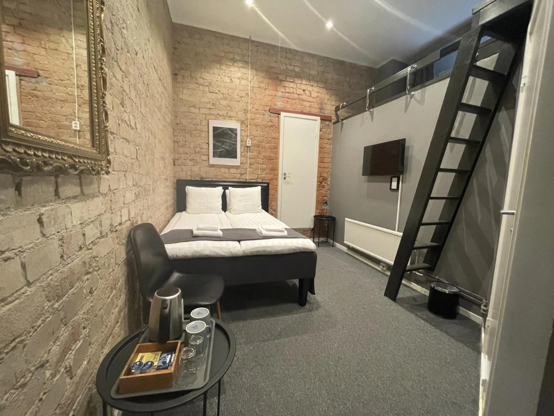 Photo of the whole room, Bed in Unique Hotel