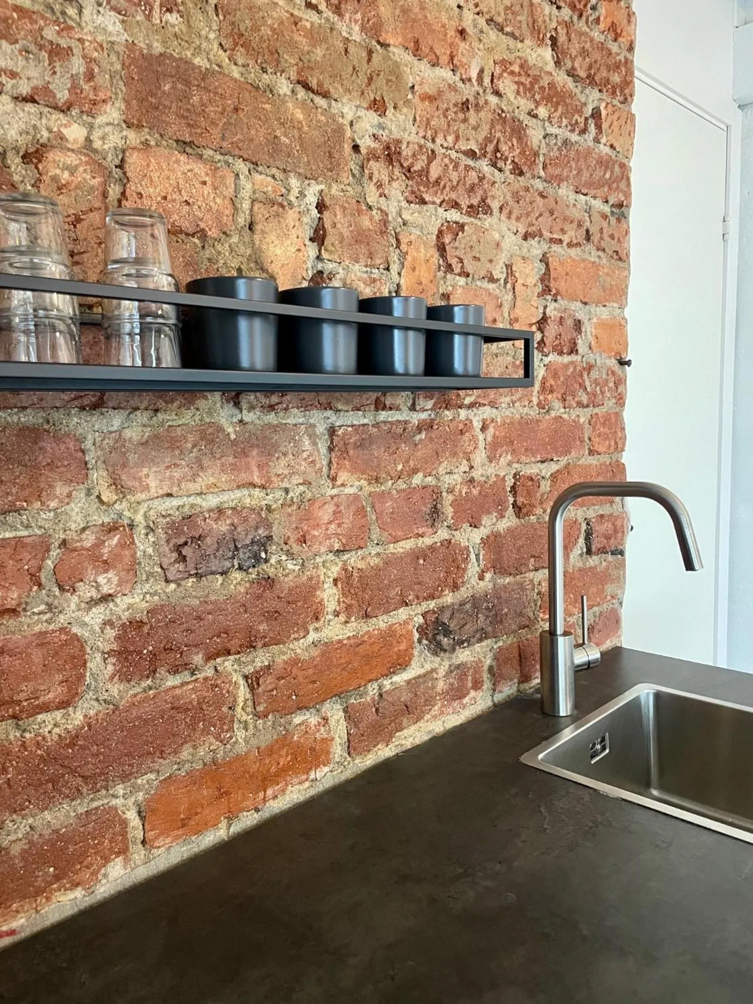 Kitchen or kitchenette in Unique Hotel