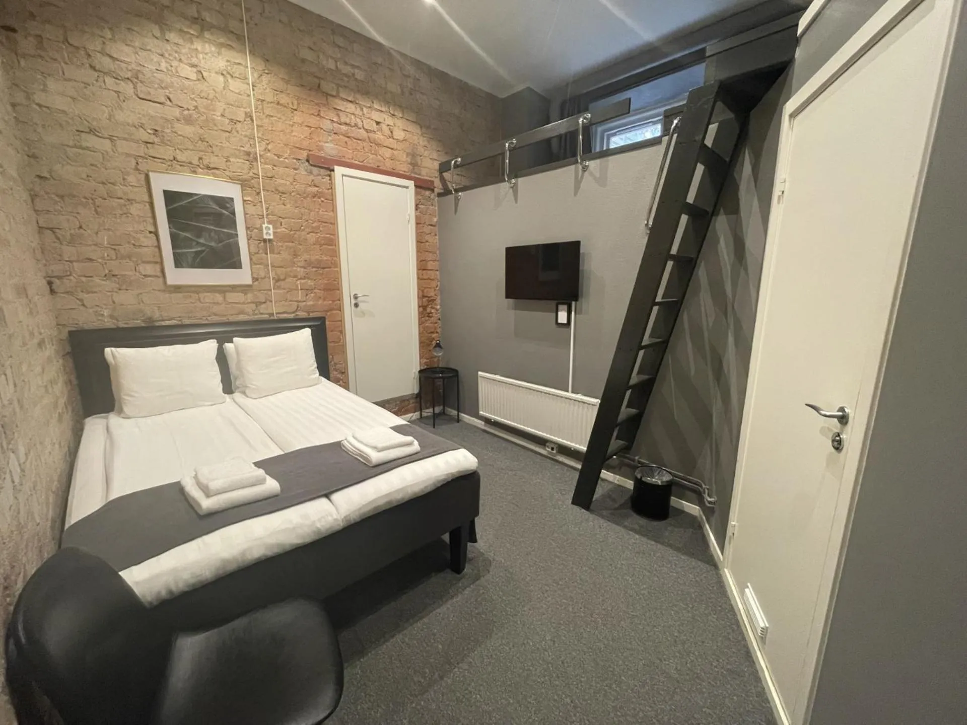 Photo of the whole room, Bed in Unique Hotel