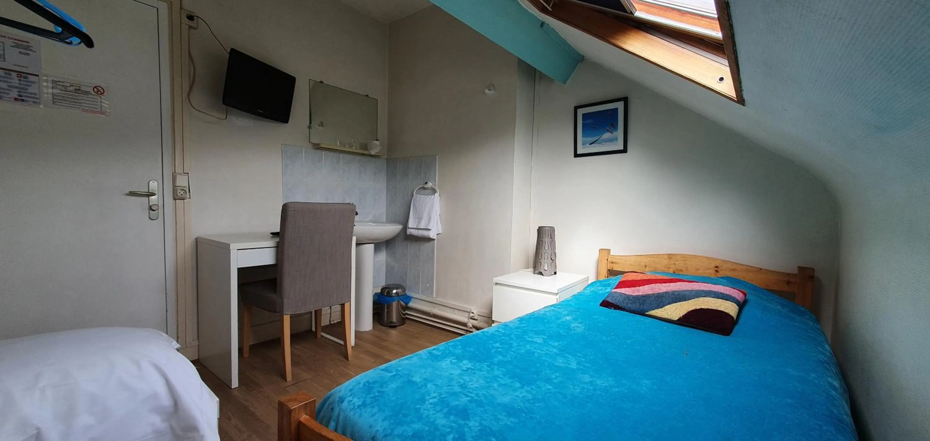 Bed in Hôtel de la poste