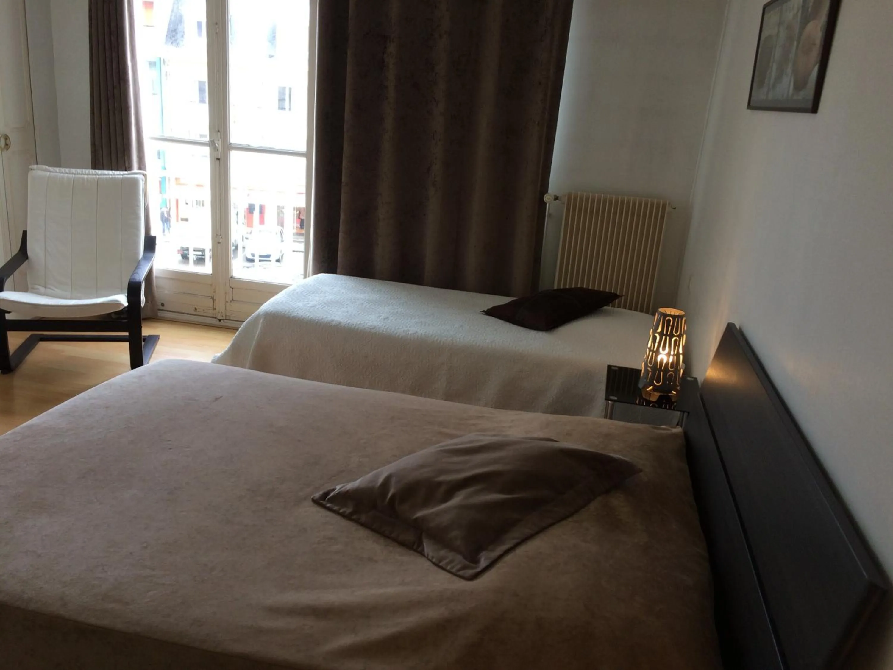 Bed in Hôtel de la poste