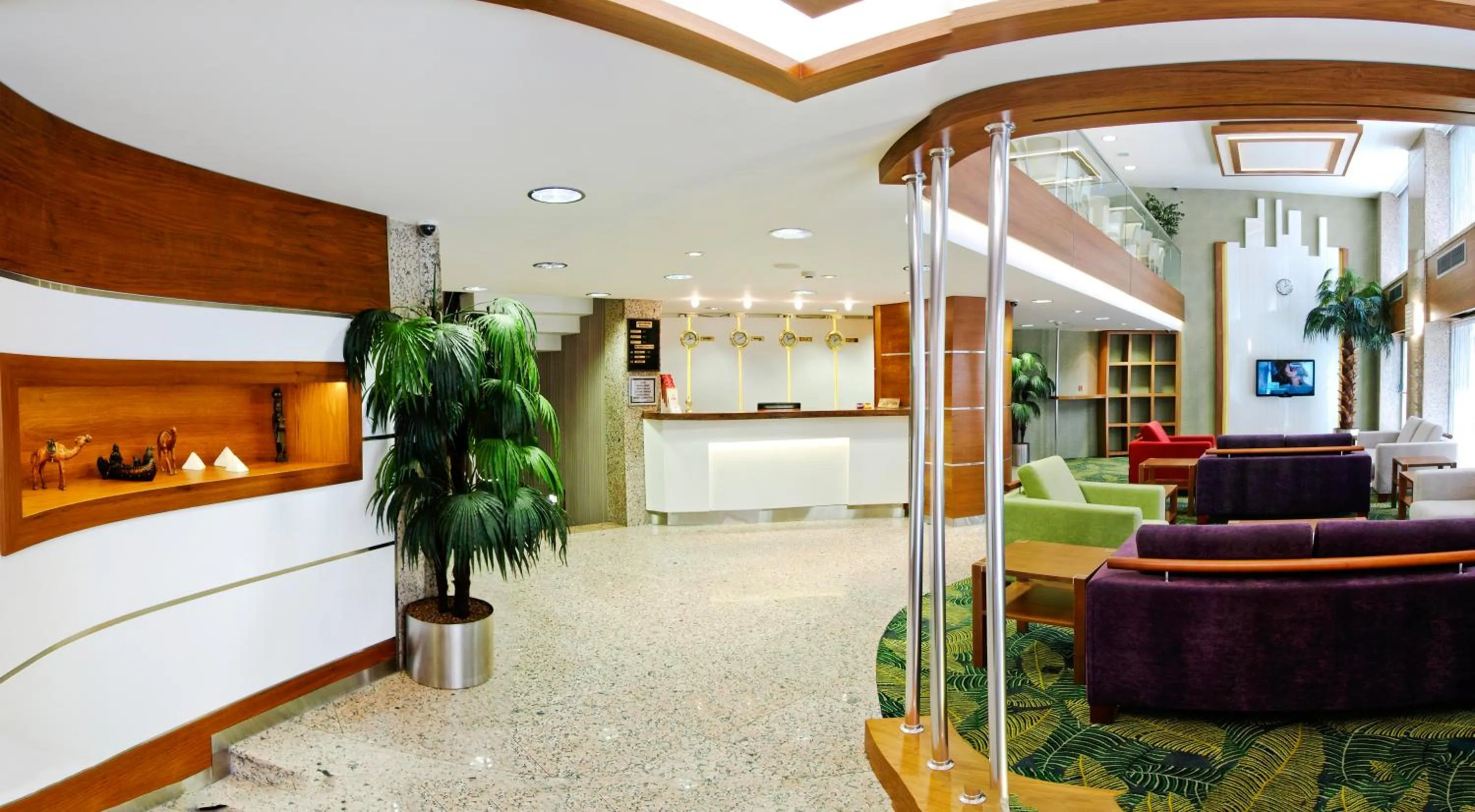 Lobby or reception in Bella Hotel