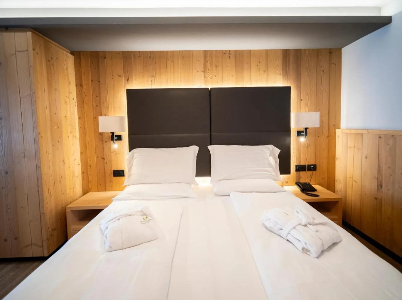 Bedroom, Bed in Hotel La Montanara Predazzo