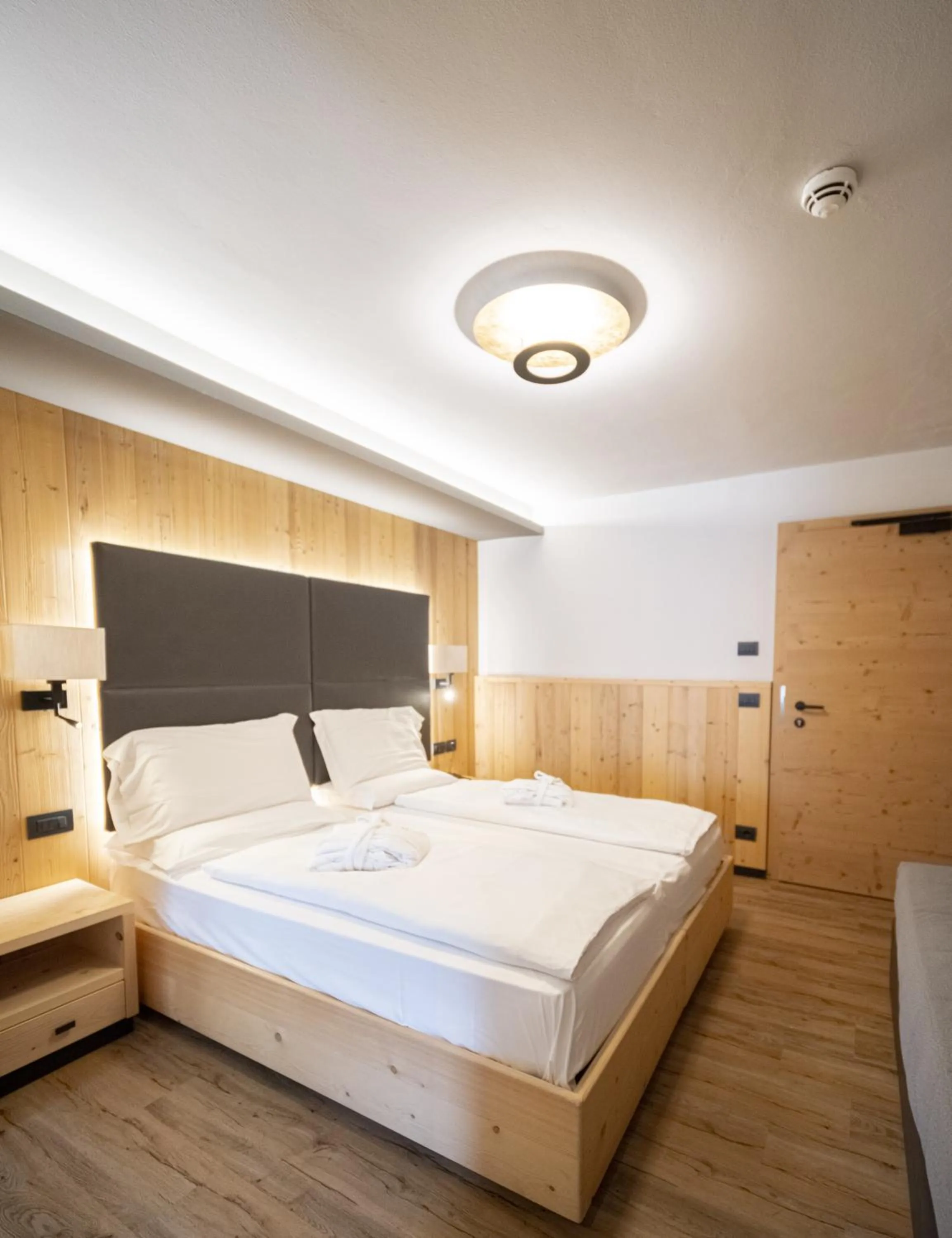 Bedroom, Bed in Hotel La Montanara Predazzo