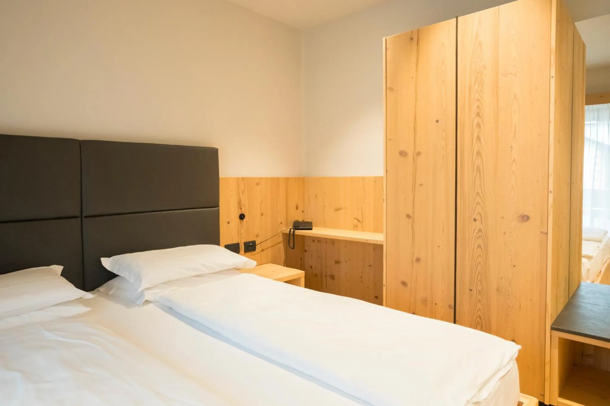 Bed in Hotel La Montanara Predazzo