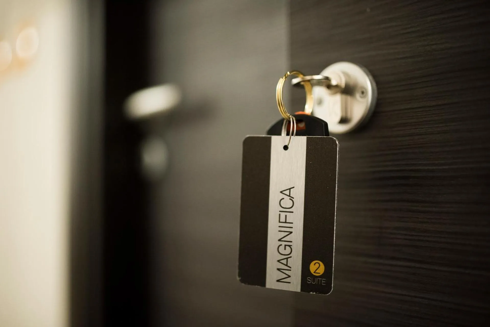 Property logo or sign in BHome Fashion Suite