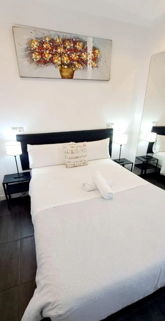 Bed in AYZ Ulises - Auto check-in property