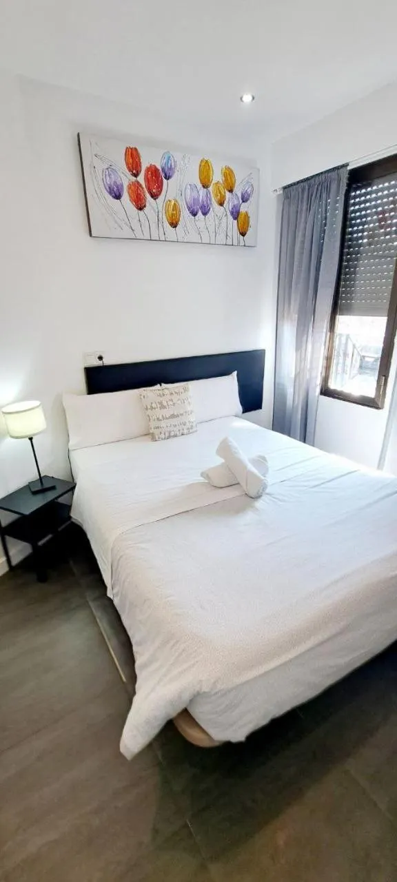 Bed in AYZ Ulises - Auto check-in property