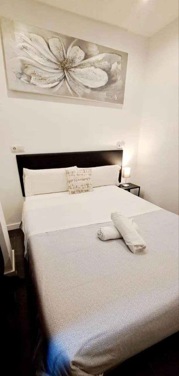 Bed in AYZ Ulises - Auto check-in property