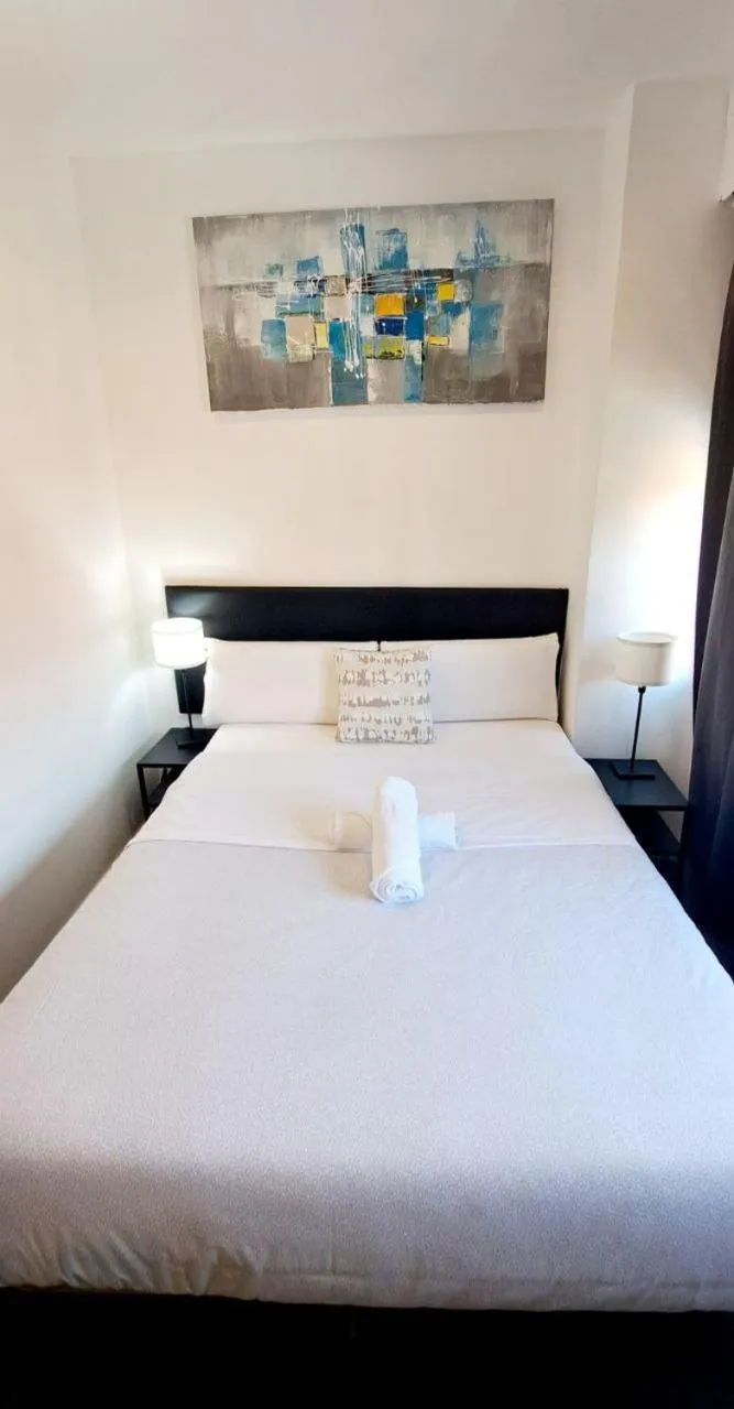Bed in AYZ Ulises - Auto check-in property