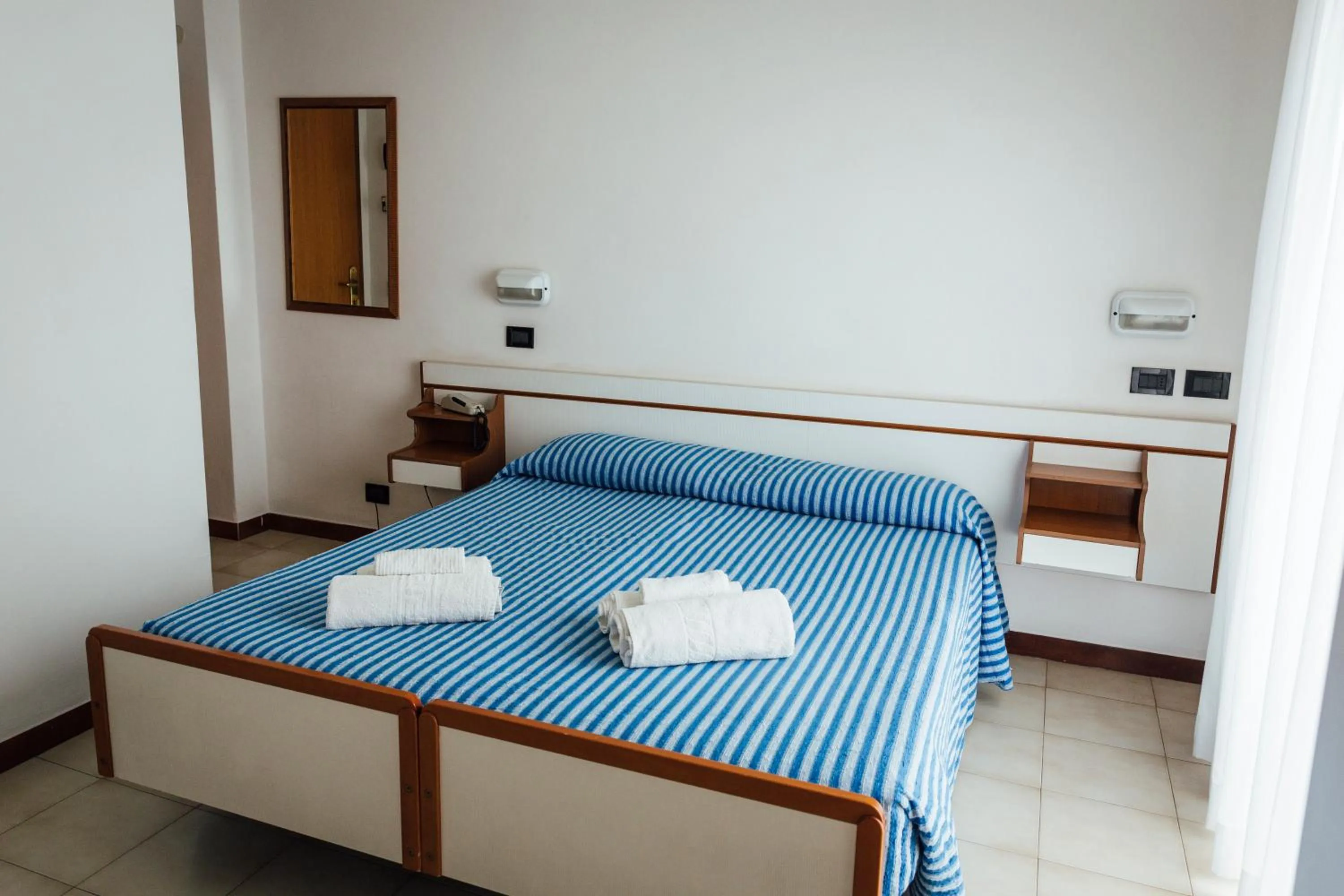 Bed in Hotel Montecarlo