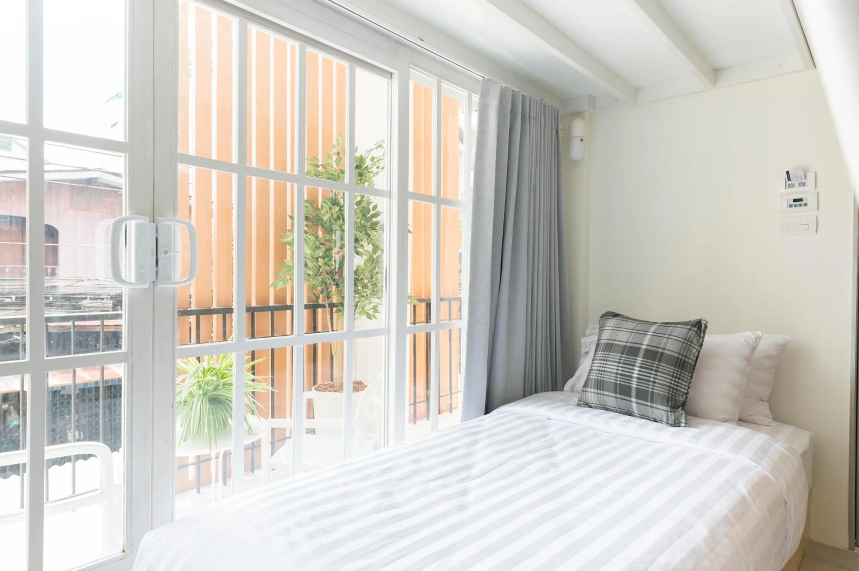 Bed in The Pattern Boutique Hotel