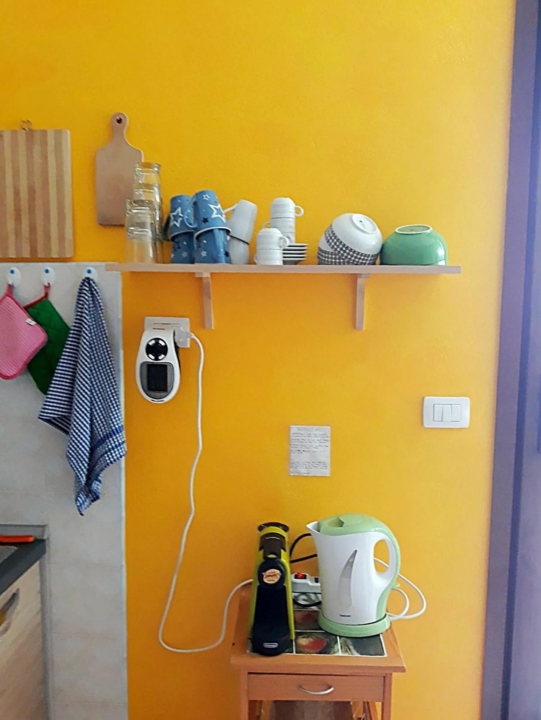 Communal kitchen in B&B Il Cortile del Sole