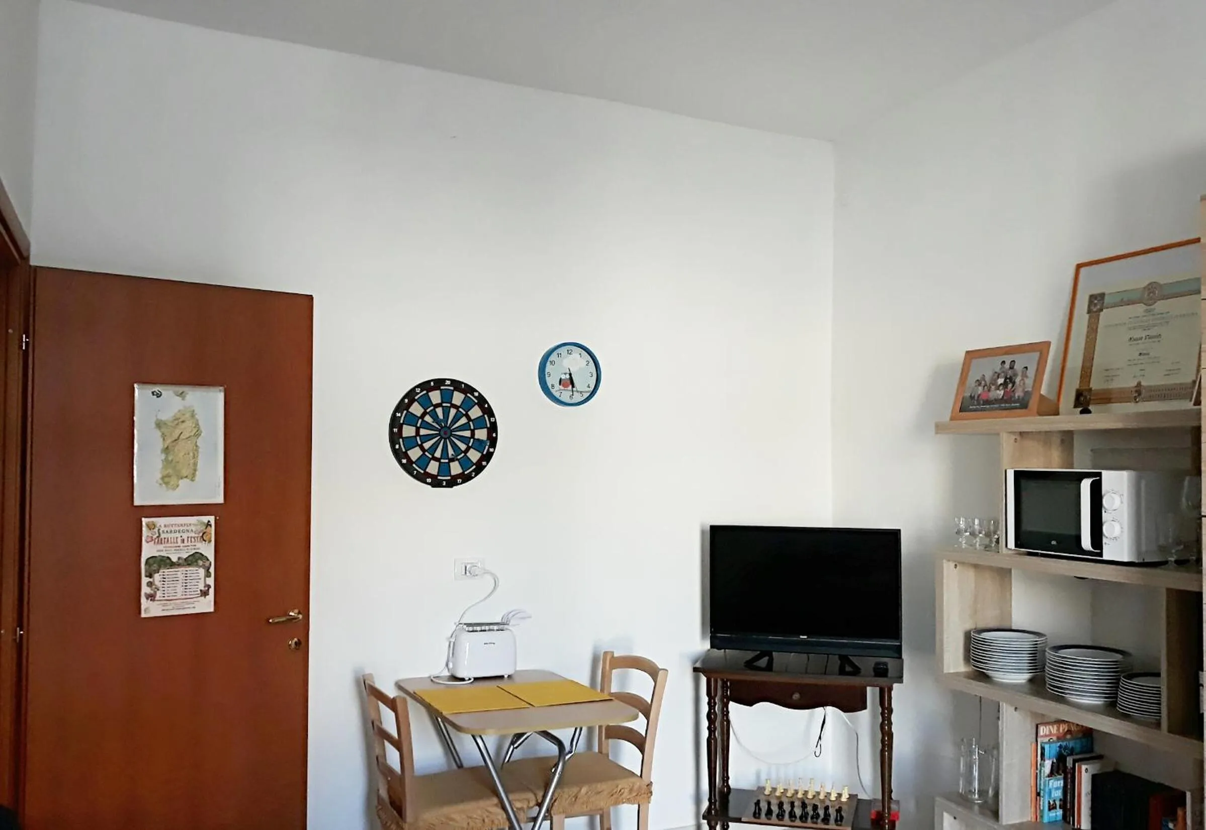 Communal lounge/ TV room in B&B Il Cortile del Sole