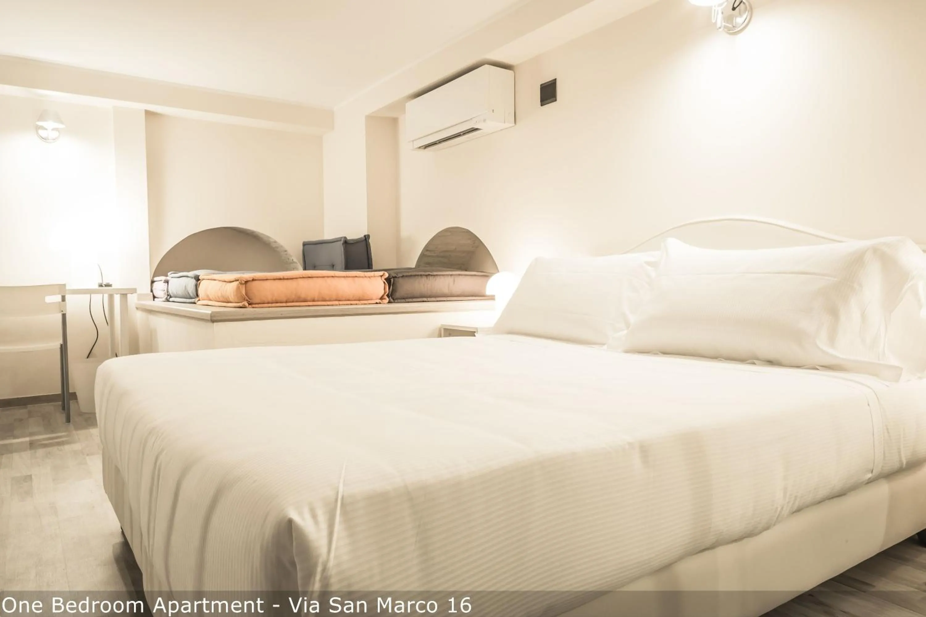 Bed in Brera Apartments in San Marco