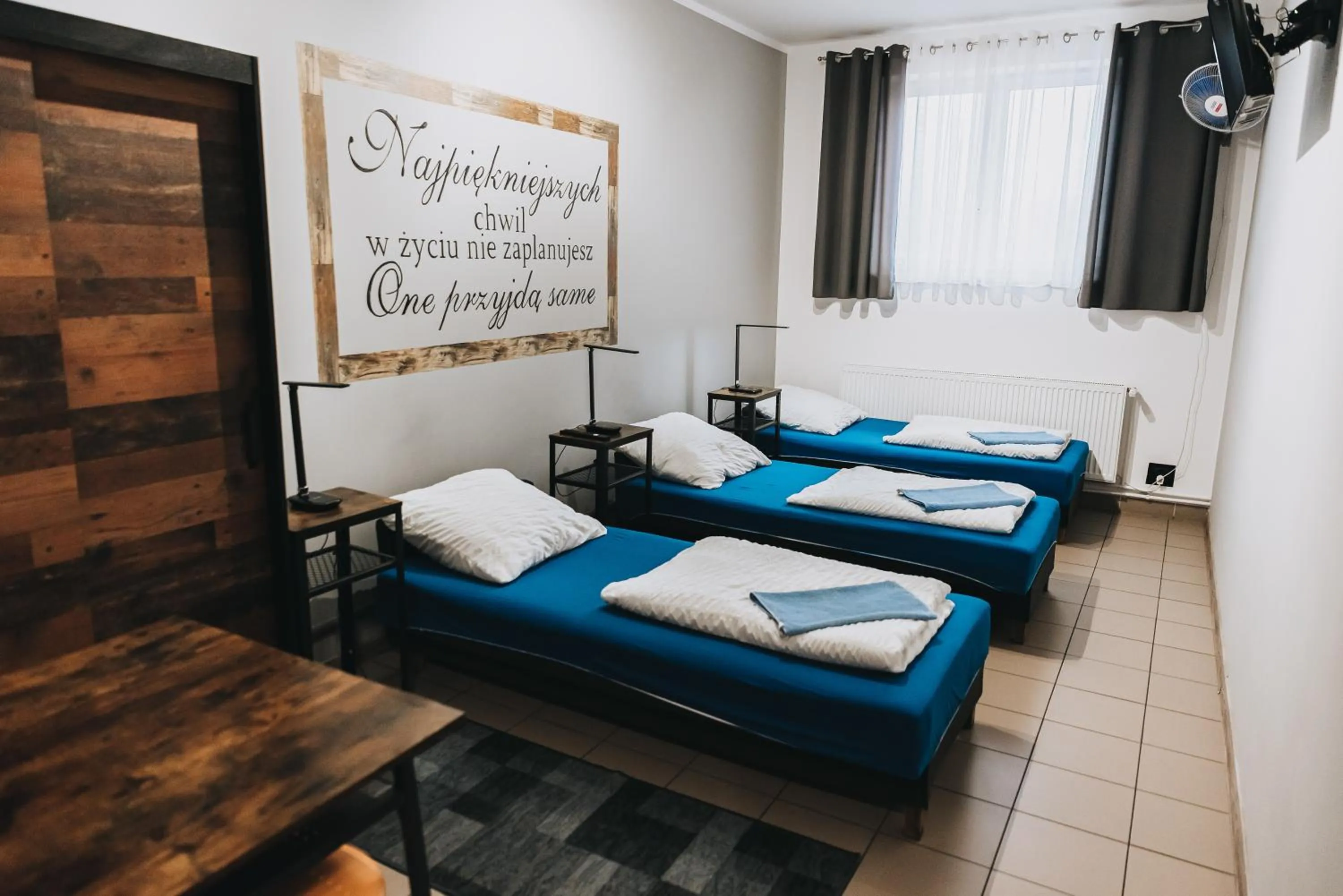 Single Bed in Male Dormitory Room in Noclegi Na Końcu Świata Bielpon