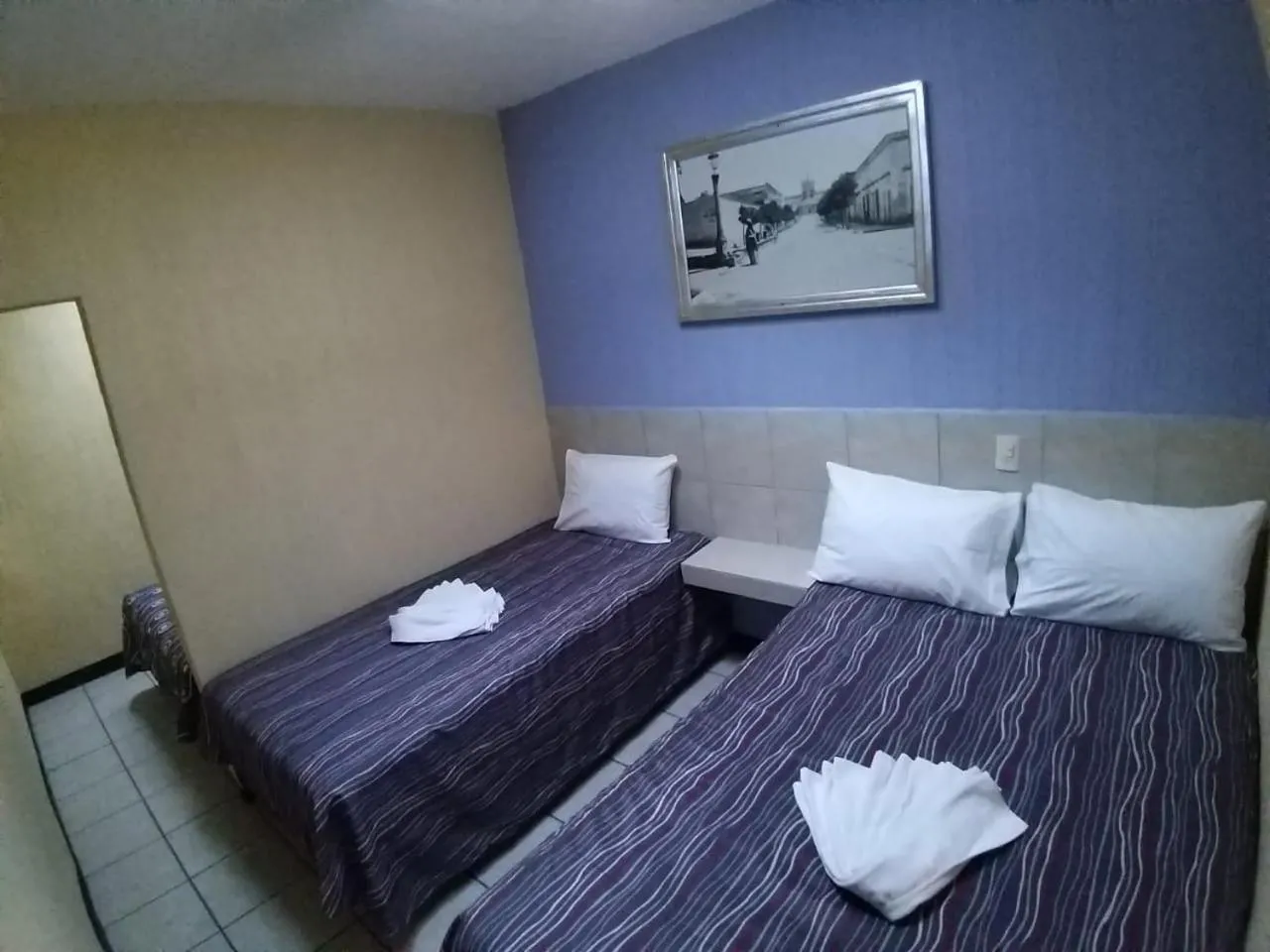 Bed in Hotel Aguila