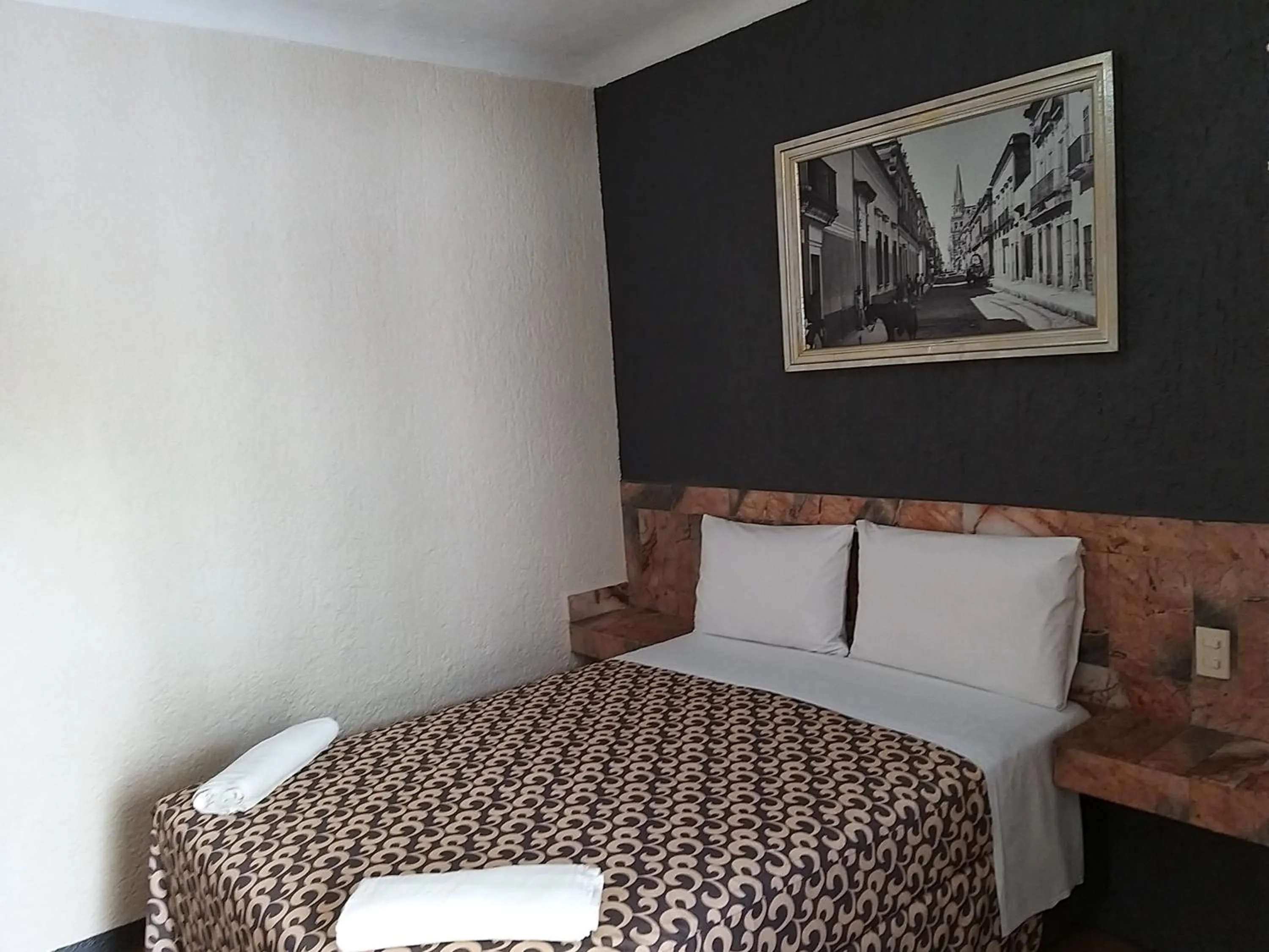 Bed in Hotel Aguila