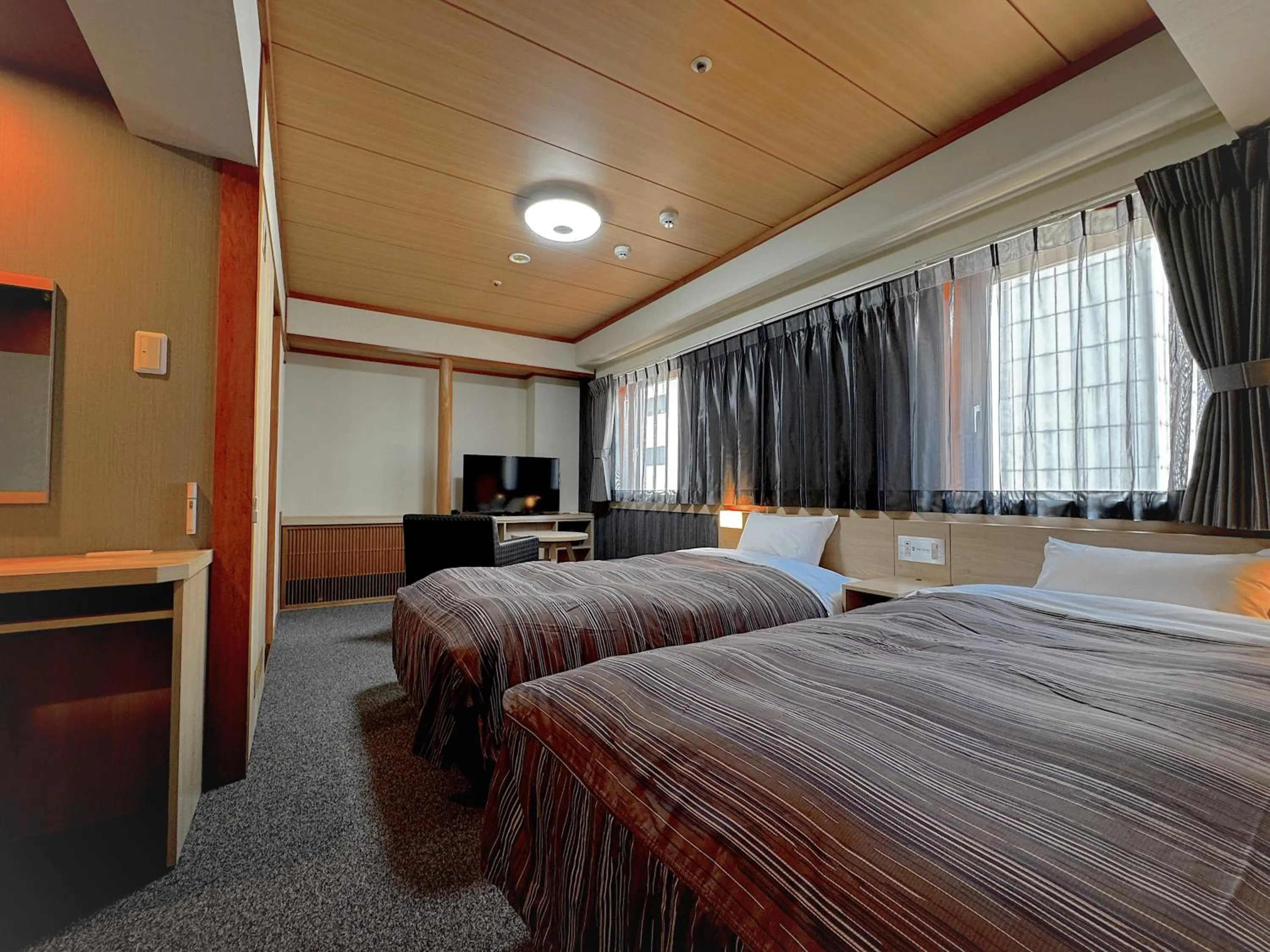 Bed in Ark Hotel Okayama -ROUTE INN HOTELS-