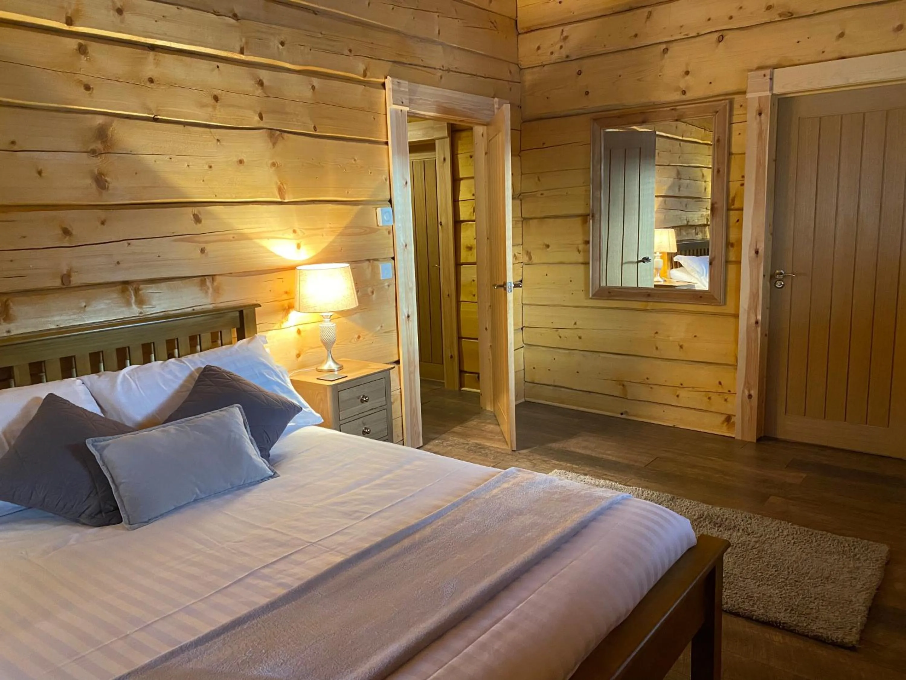 Bed in Ewes Water Log Cabins
