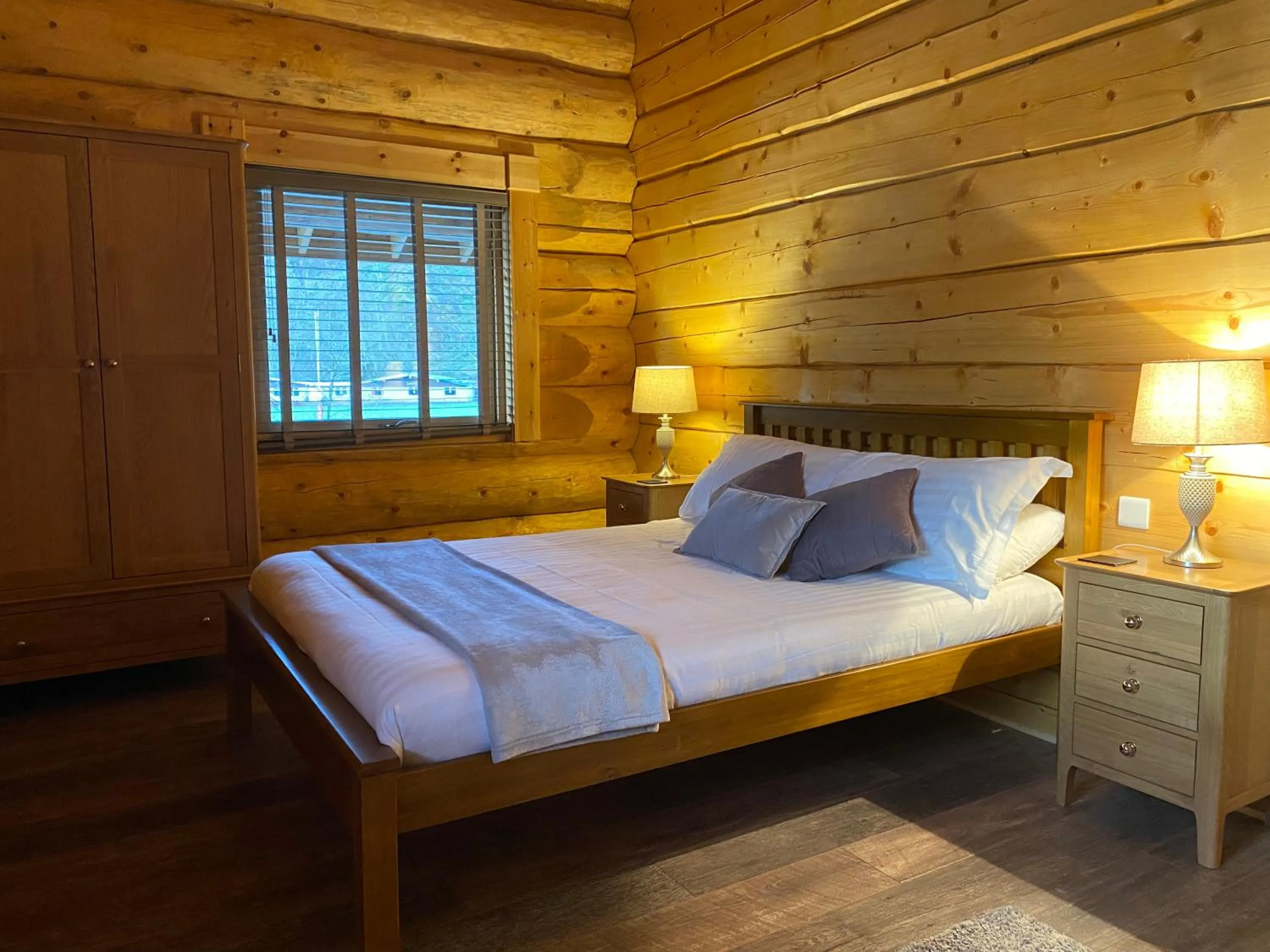 Bed in Ewes Water Log Cabins