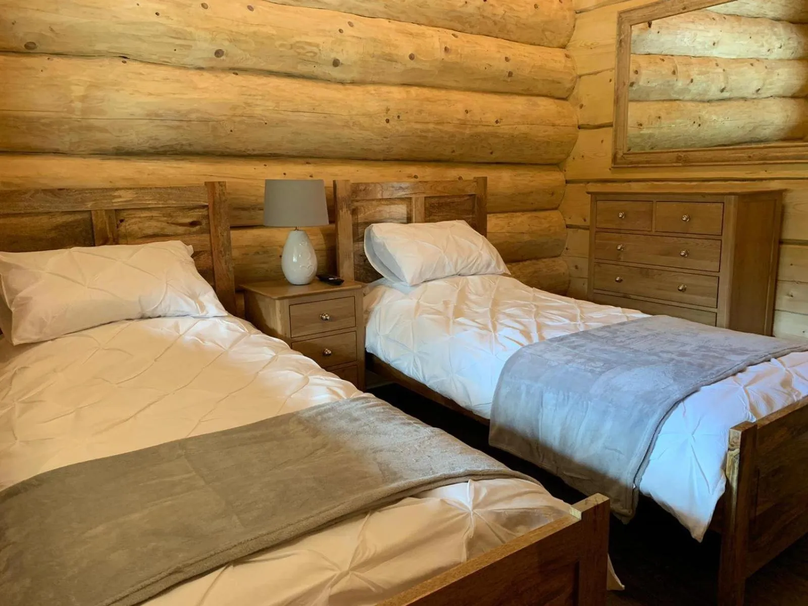 Bed in Ewes Water Log Cabins