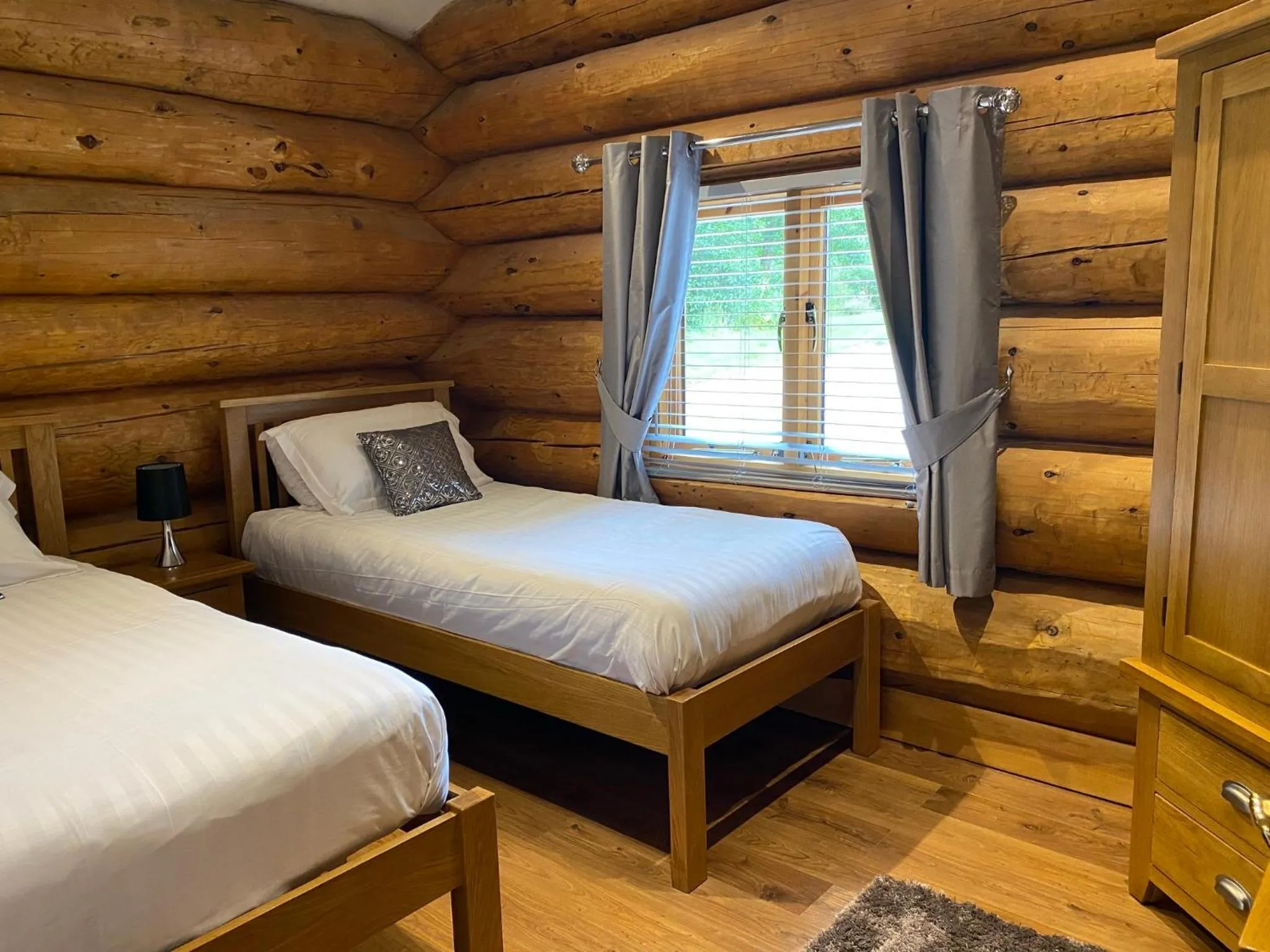 Bed in Ewes Water Log Cabins