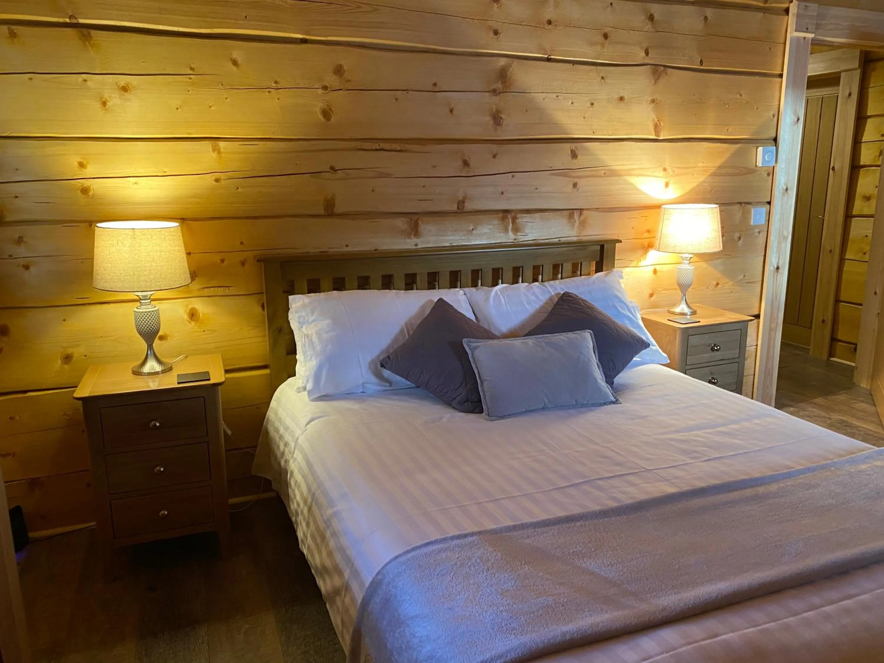 Bed in Ewes Water Log Cabins