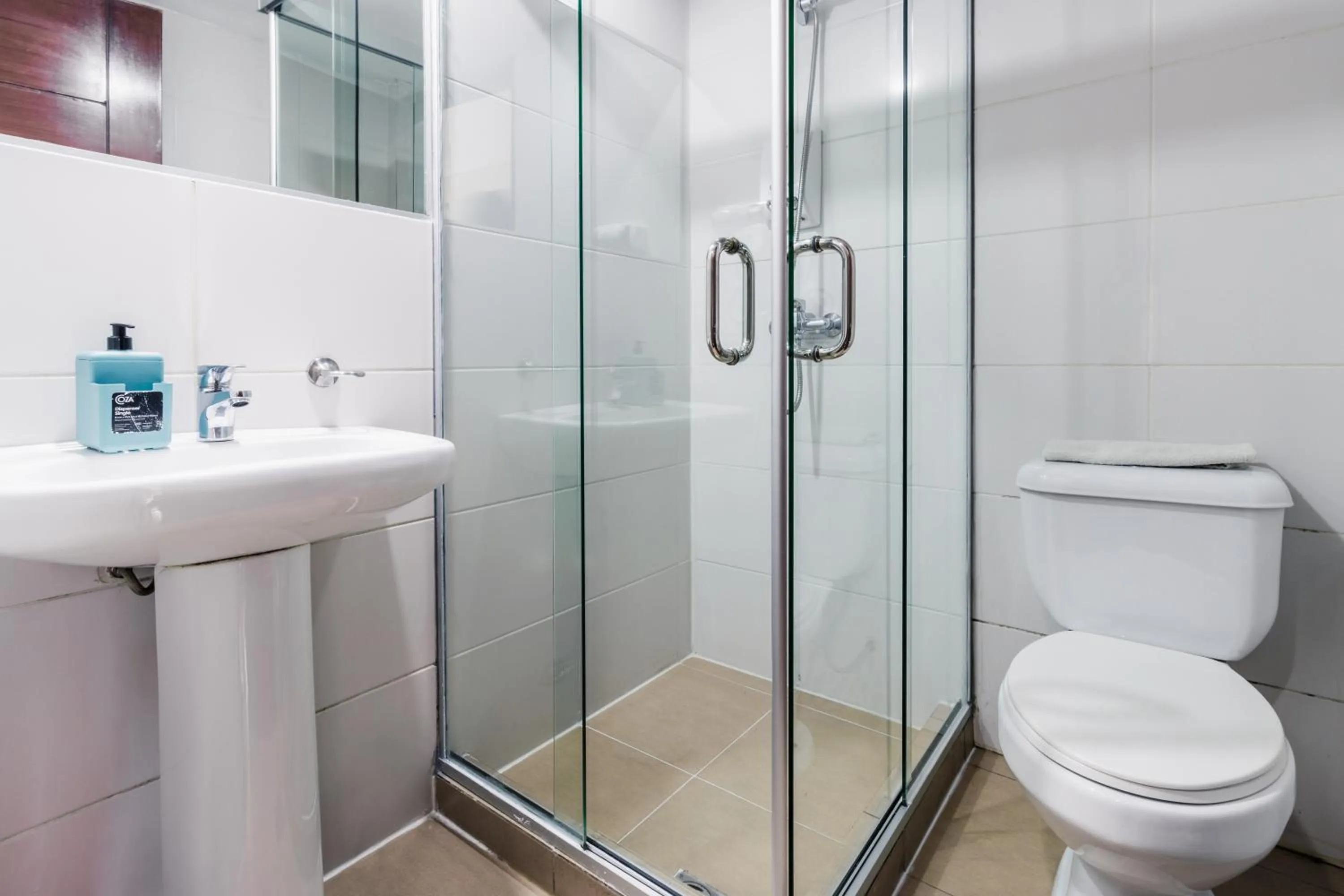 Bathroom in Luxstone Executive & Suites