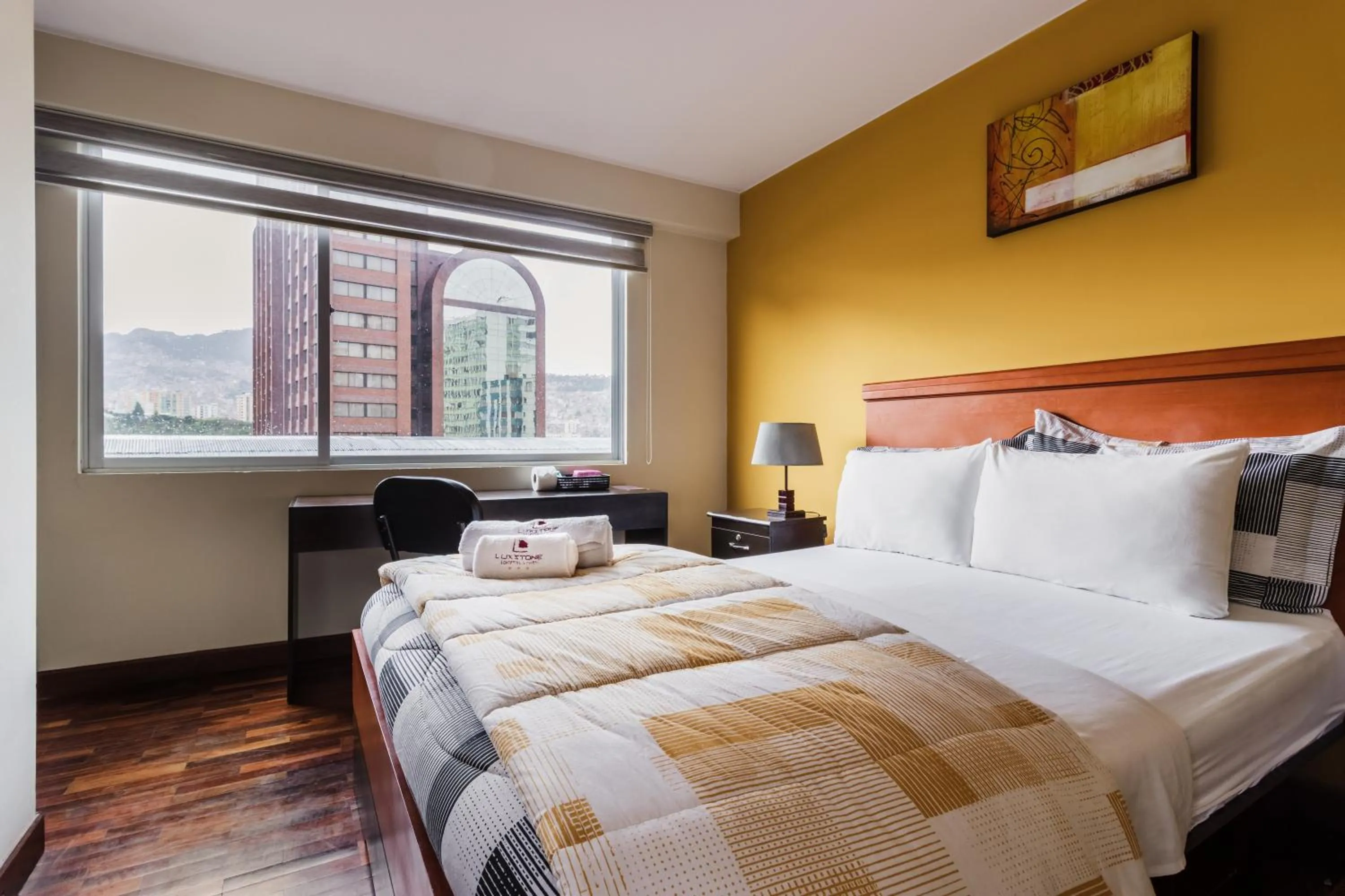 Bedroom, Bed in Luxstone Executive & Suites