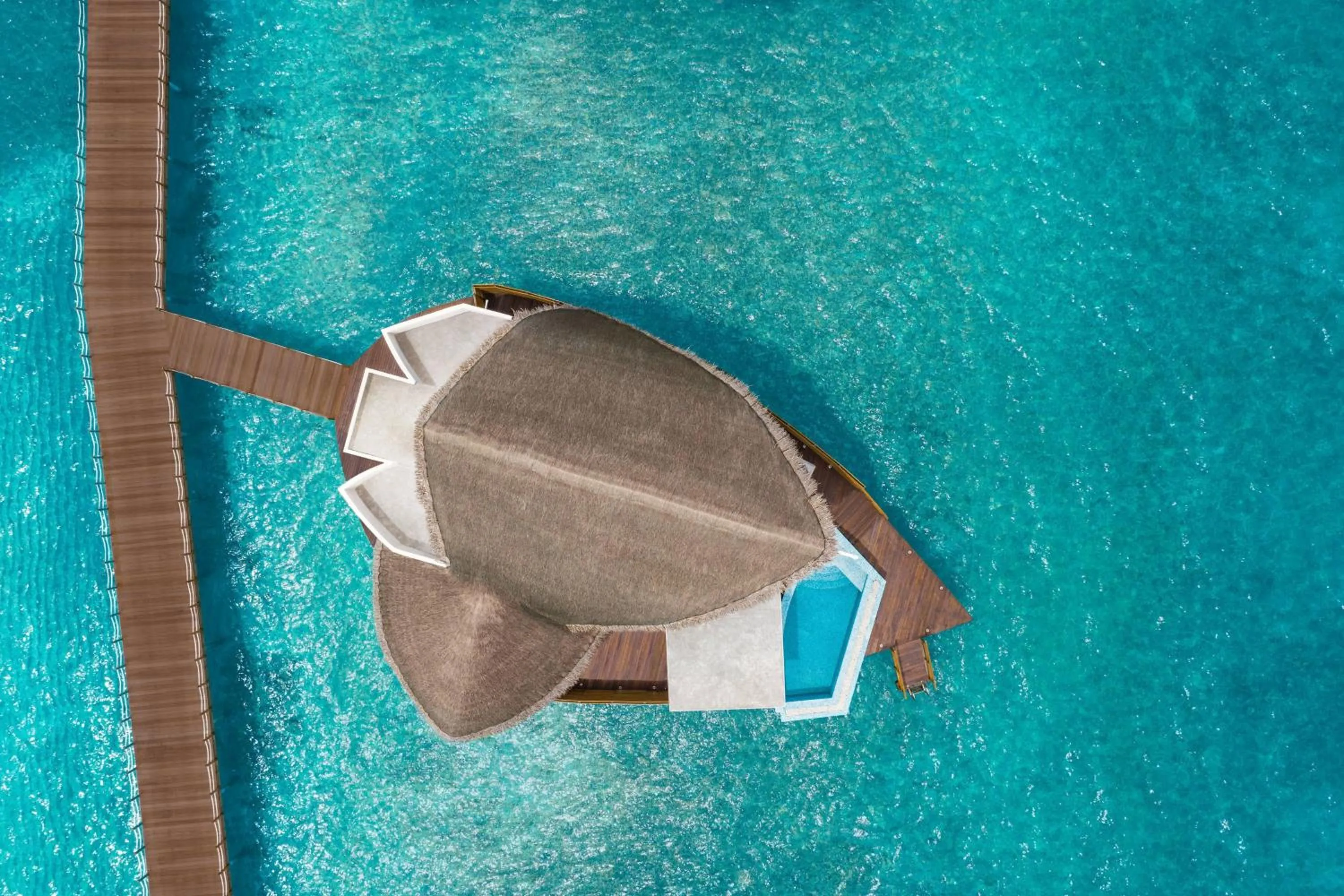 Swimming pool in JW Marriott Maldives Resort & Spa