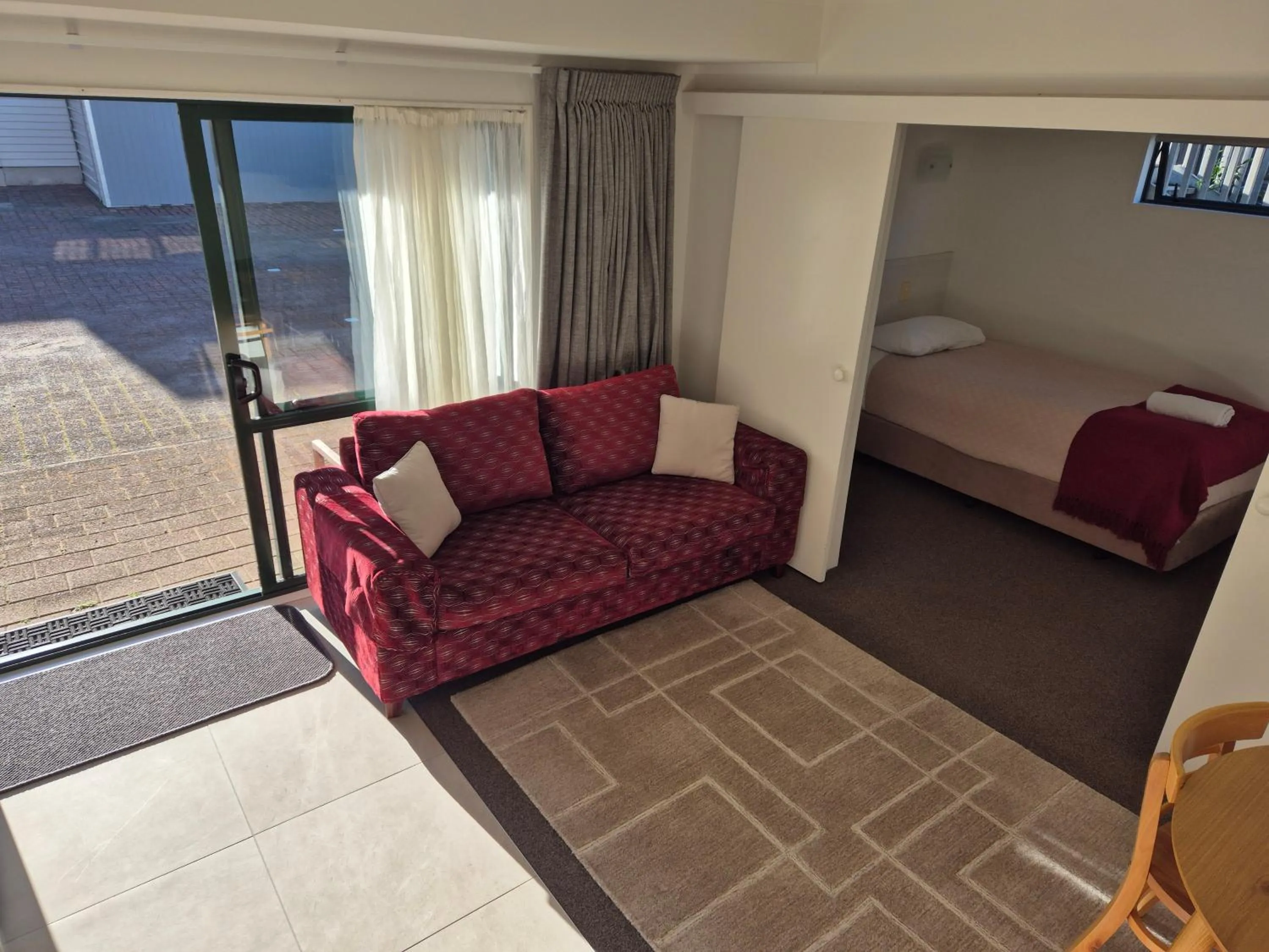 Living room, Bed in Blue Marlin Apartments