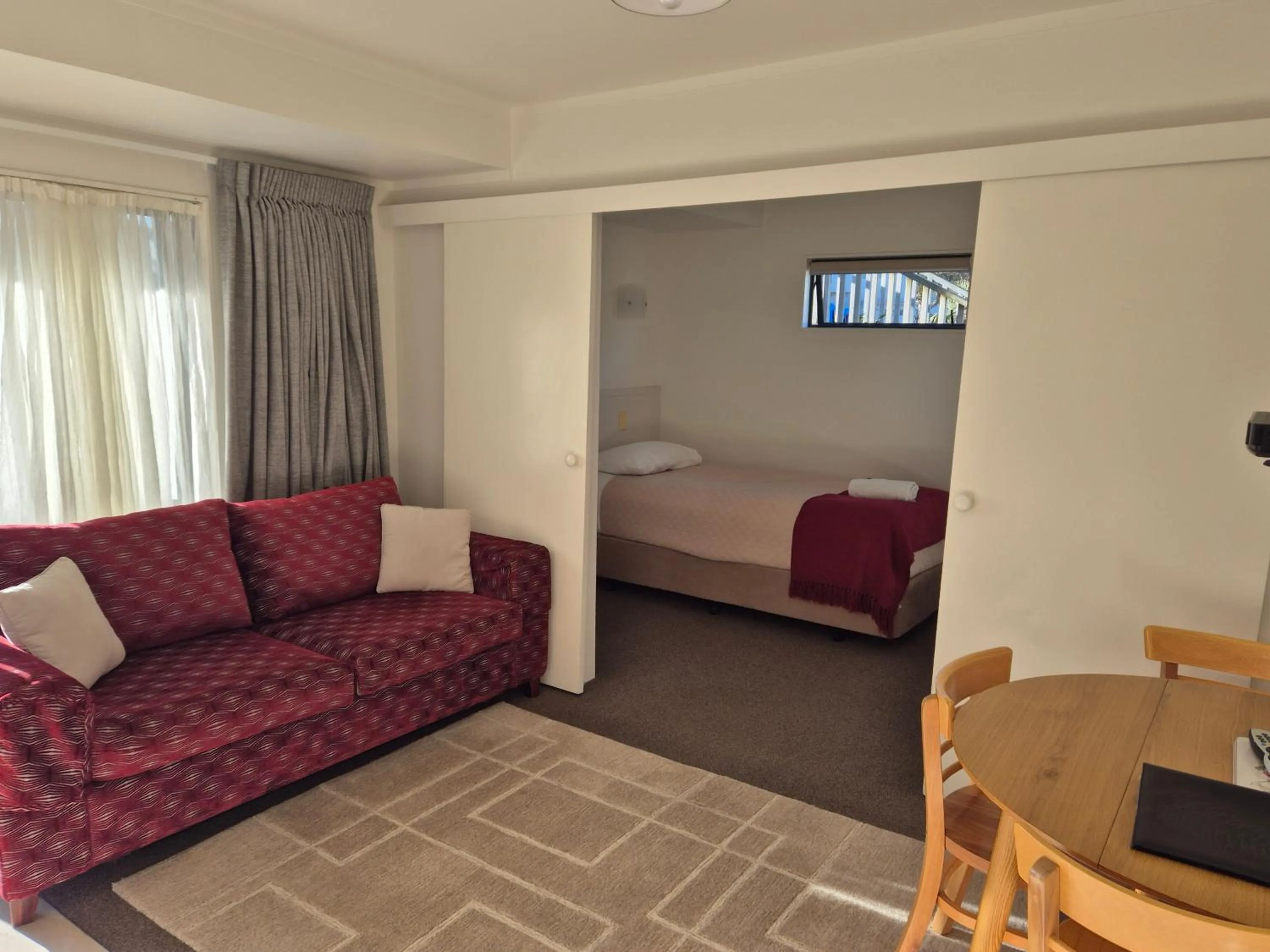 Living room, Bed in Blue Marlin Apartments