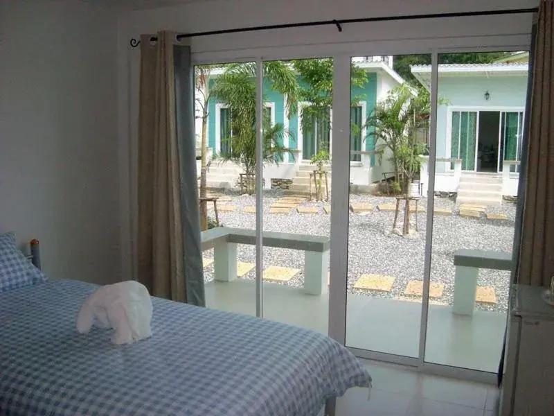 Bed in Charlie's Bungalows Bed in Charlie's Bungalows