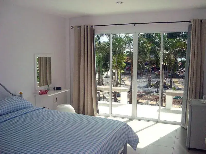 Bed in Charlie's Bungalows Bed in Charlie's Bungalows