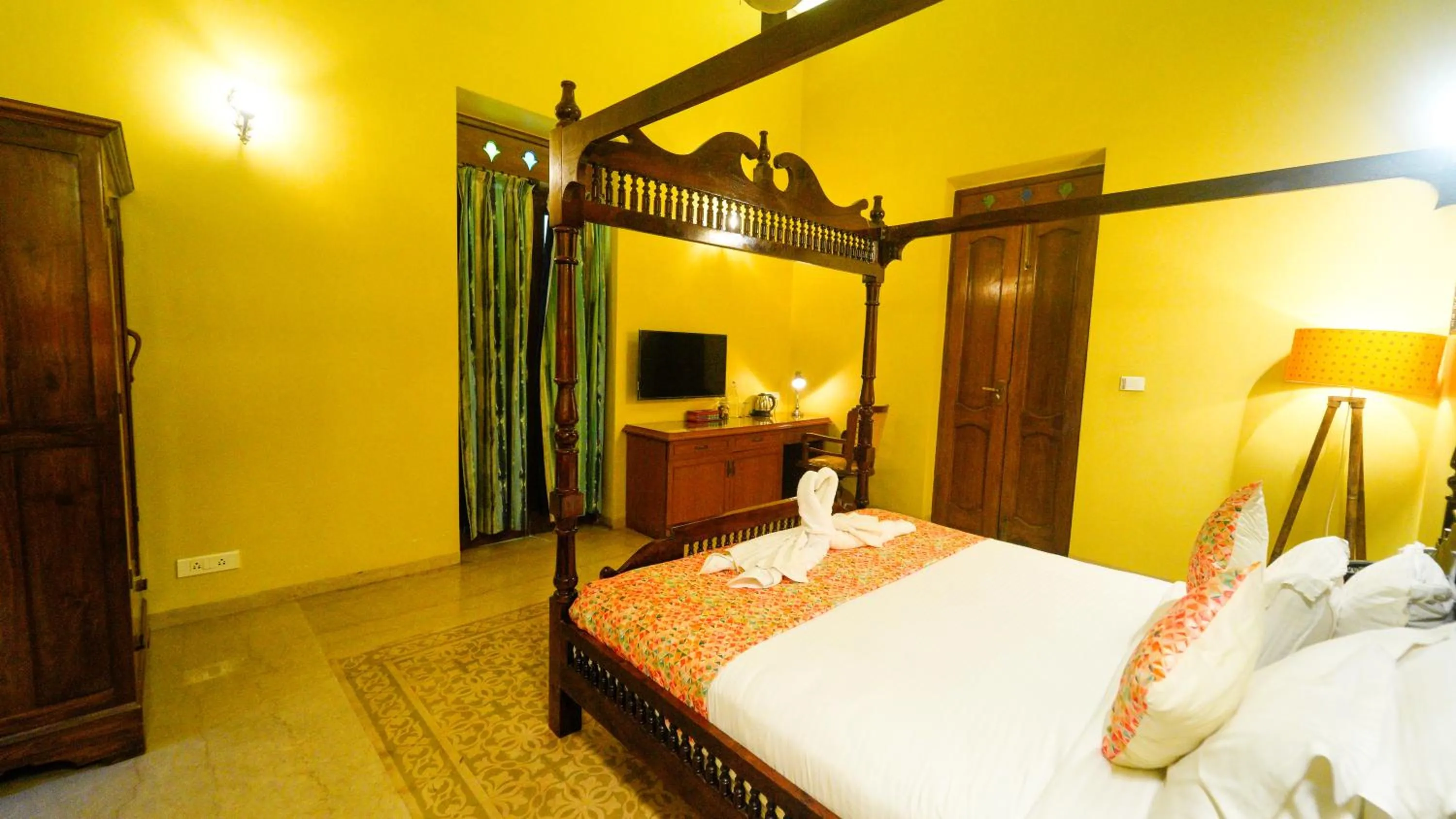 Bed in Surya Kiran Heritage Hotel