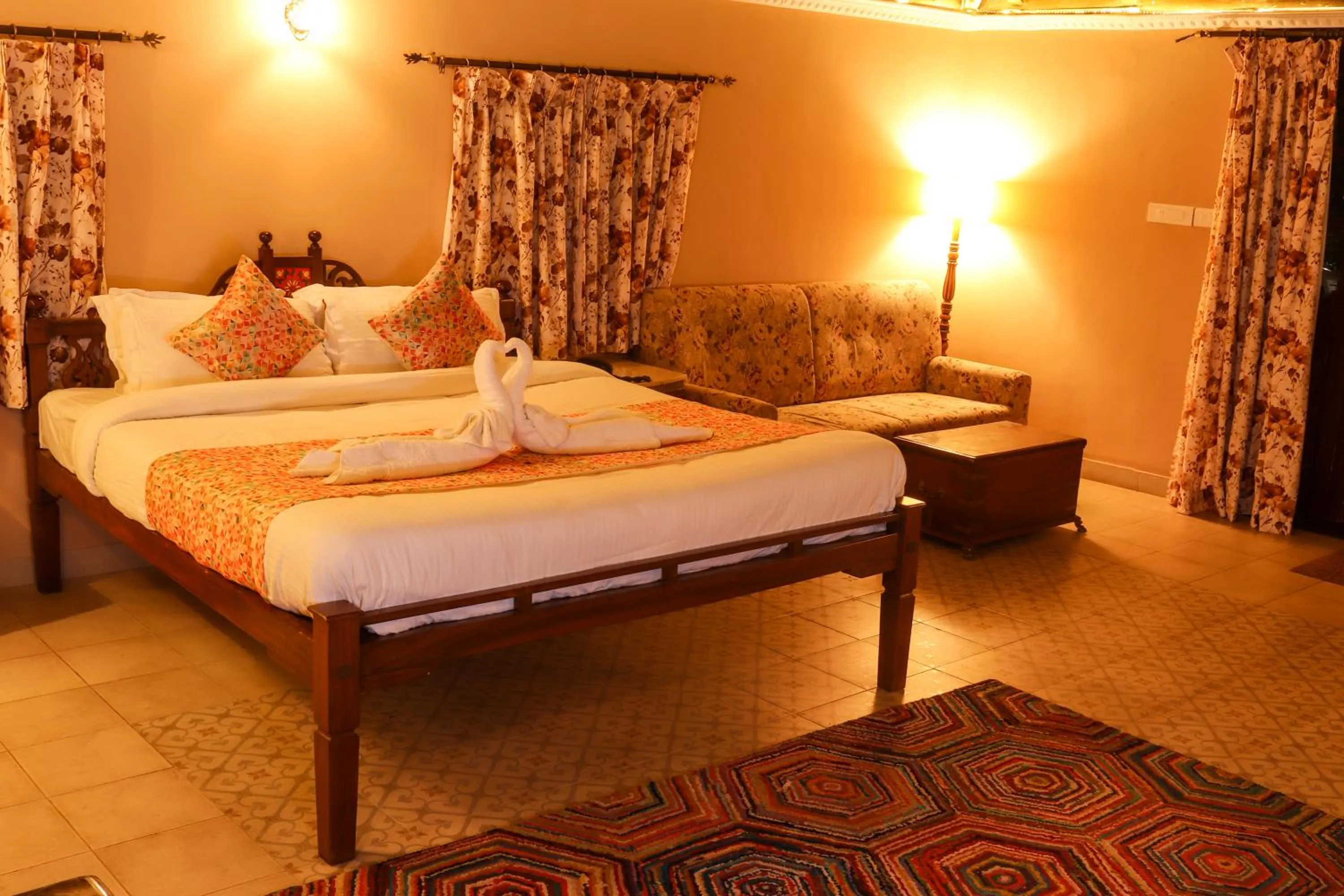 Bed in Surya Kiran Heritage Hotel