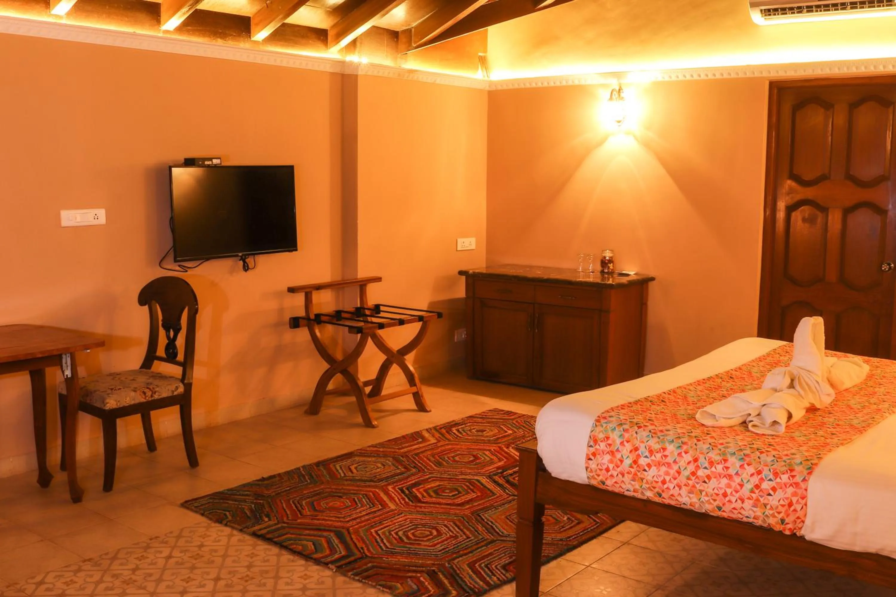 Bed in Surya Kiran Heritage Hotel