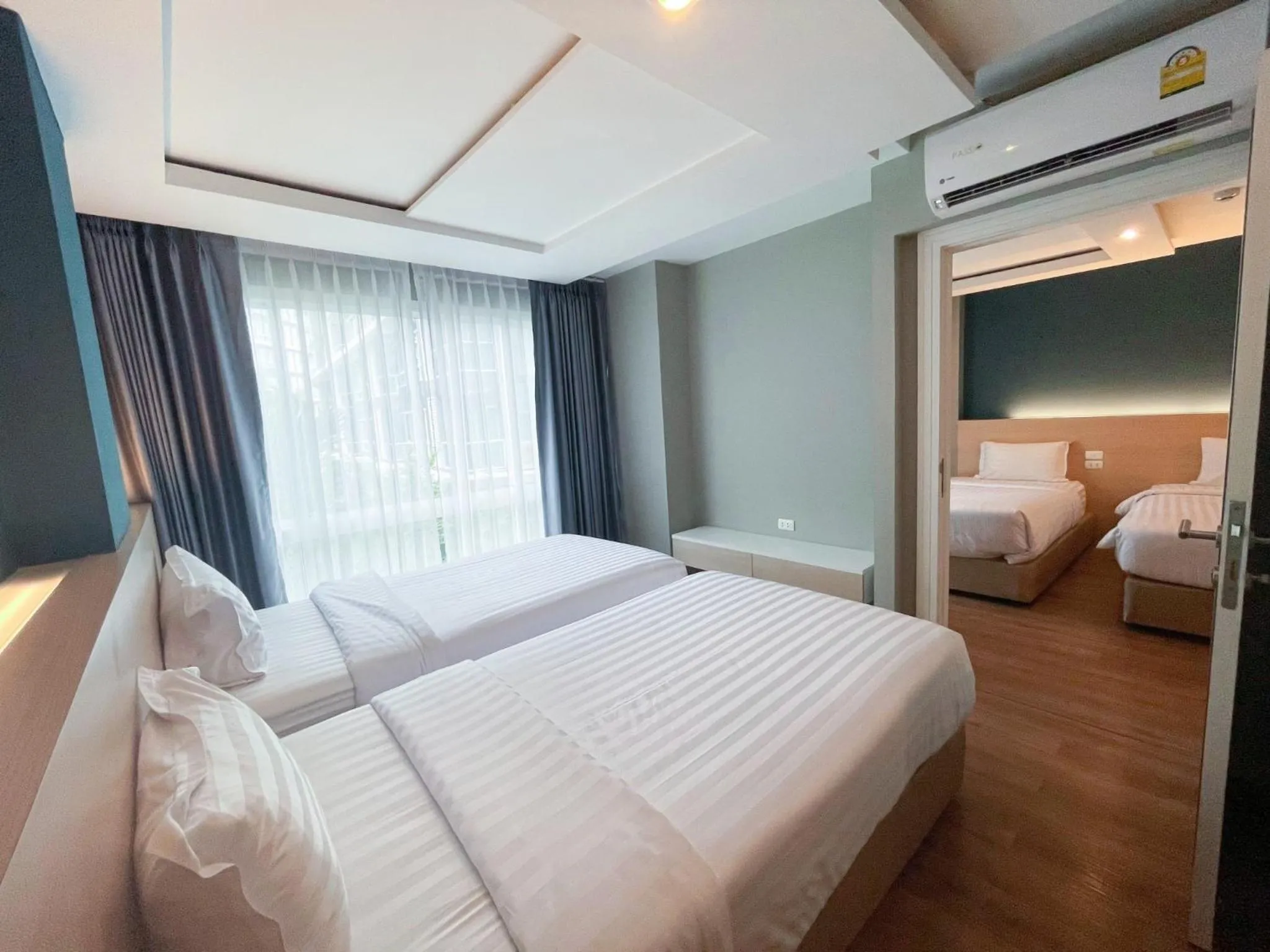 Bed in Wisdom Hotel & Residence